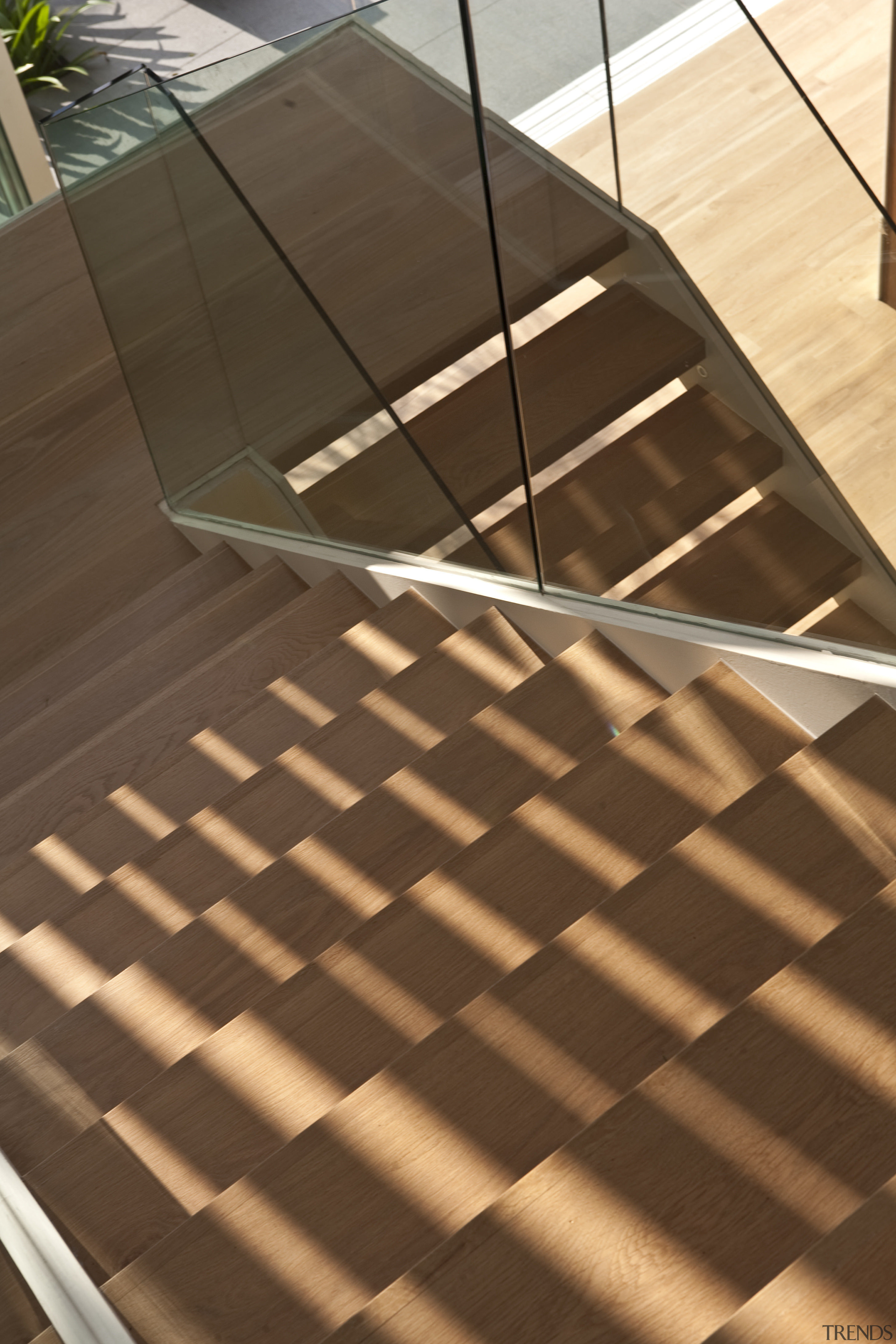 View of home designed by Wallflower Architecture &amp; angle, architecture, daylighting, floor, flooring, hardwood, line, stairs, structure, tile, wood, brown