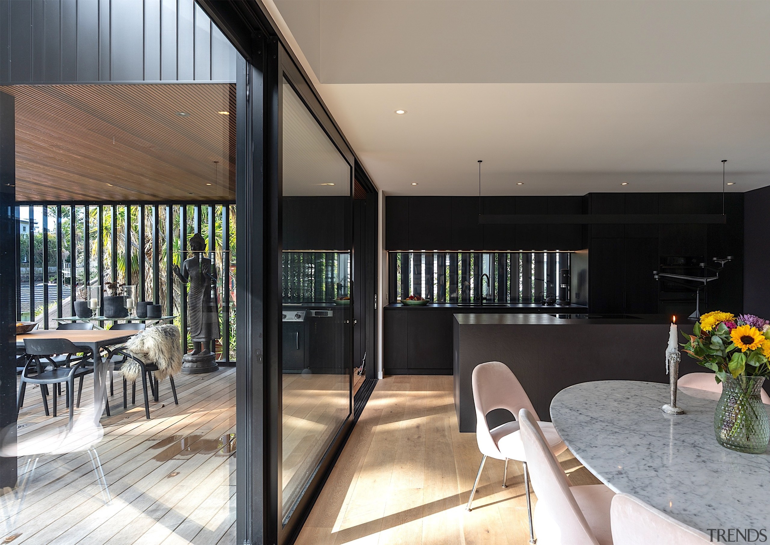 Kitchen and dining a sliding door away from 