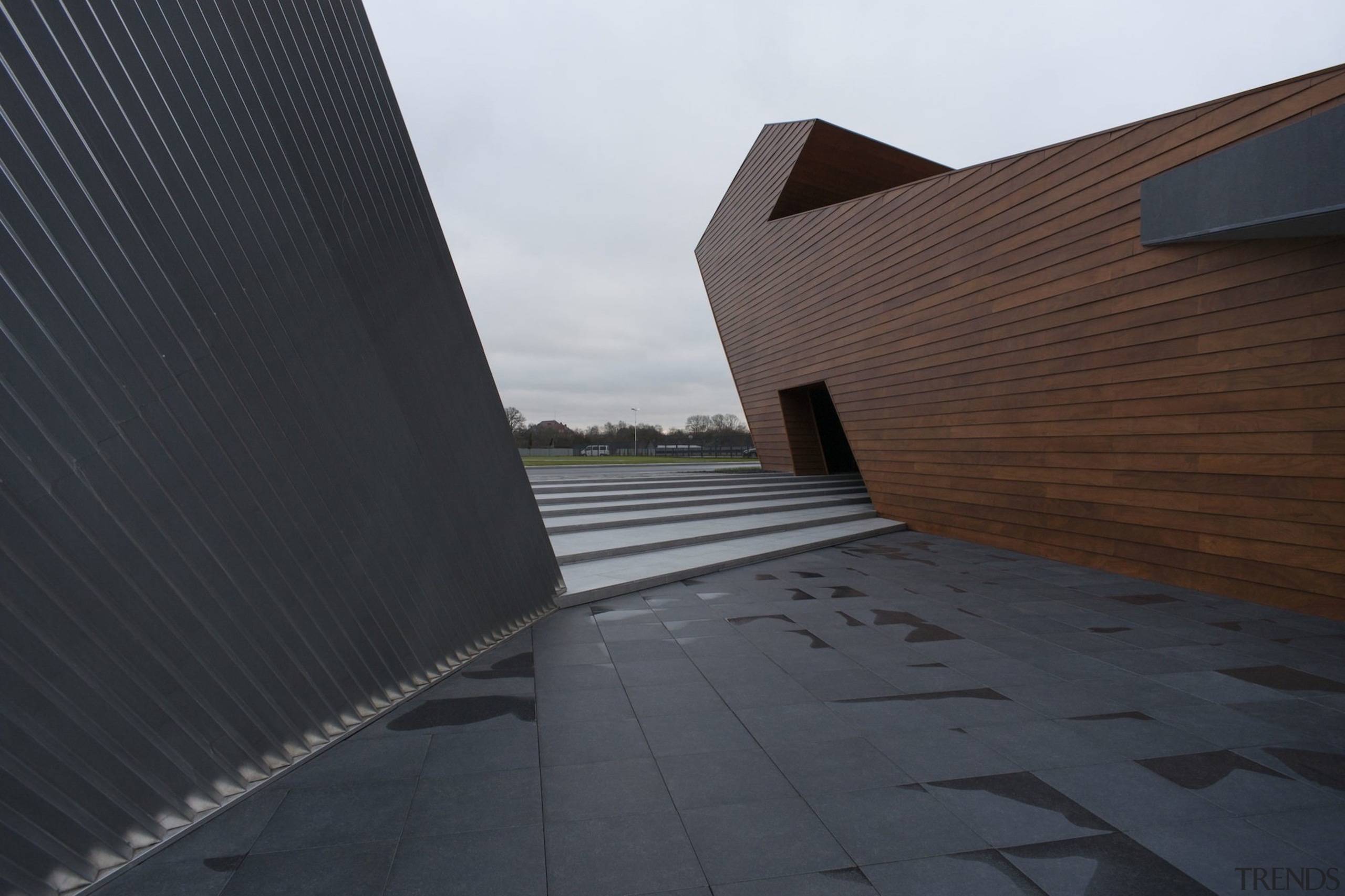 New brandy warehouse by TOTEMENT/PAPER - New brandy angle, architecture, building, daylighting, facade, house, line, reflection, road surface, roof, sky, structure, sunlight, wood, black