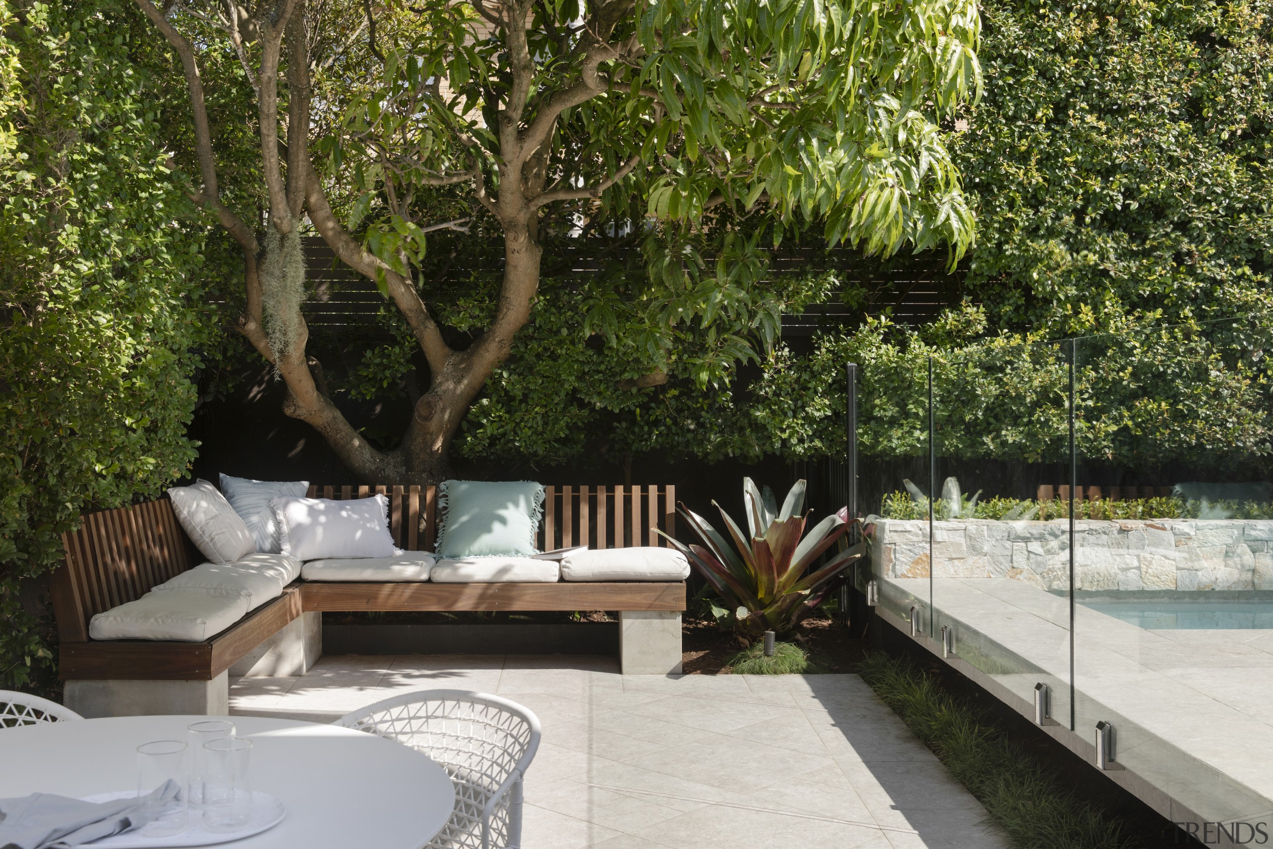 The porcelain tile floors and custom-built bench seating 