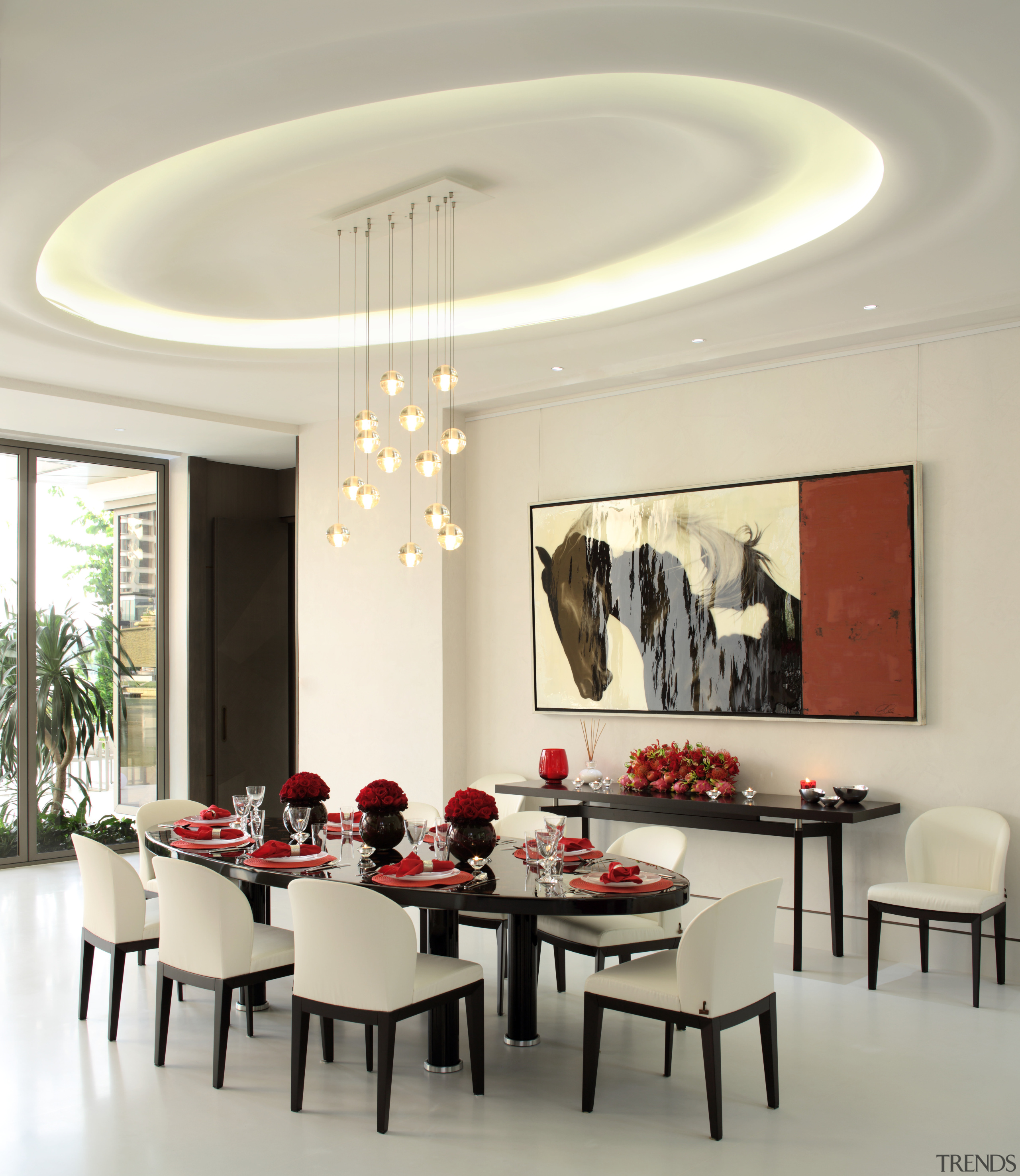 The dining setting is enhanced by a ceiling ceiling, dining room, furniture, interior design, light fixture, living room, room, table, gray