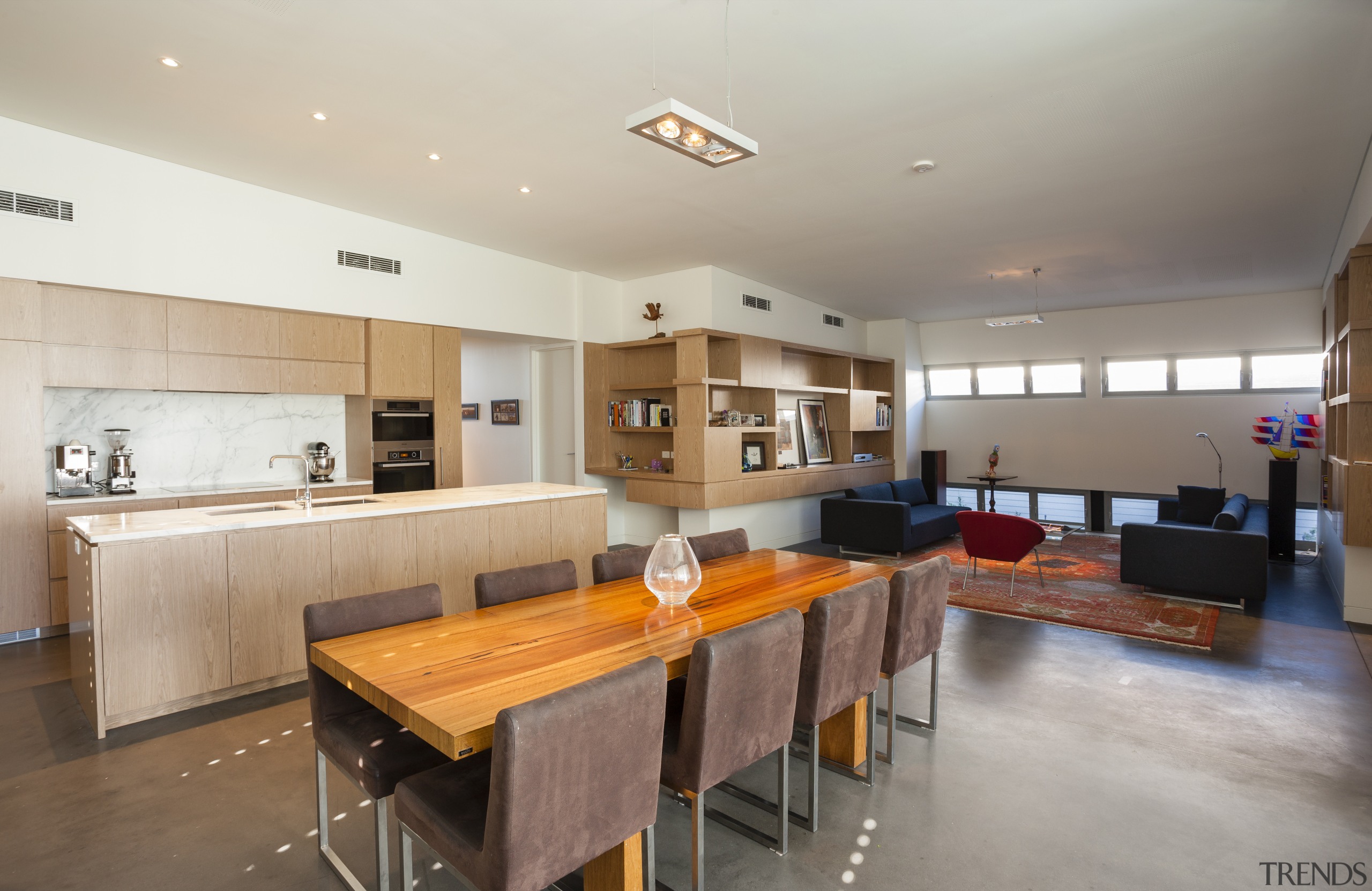 Dining area with kitchen behind. - Dining area ceiling, countertop, floor, flooring, interior design, kitchen, property, real estate, room, table, gray