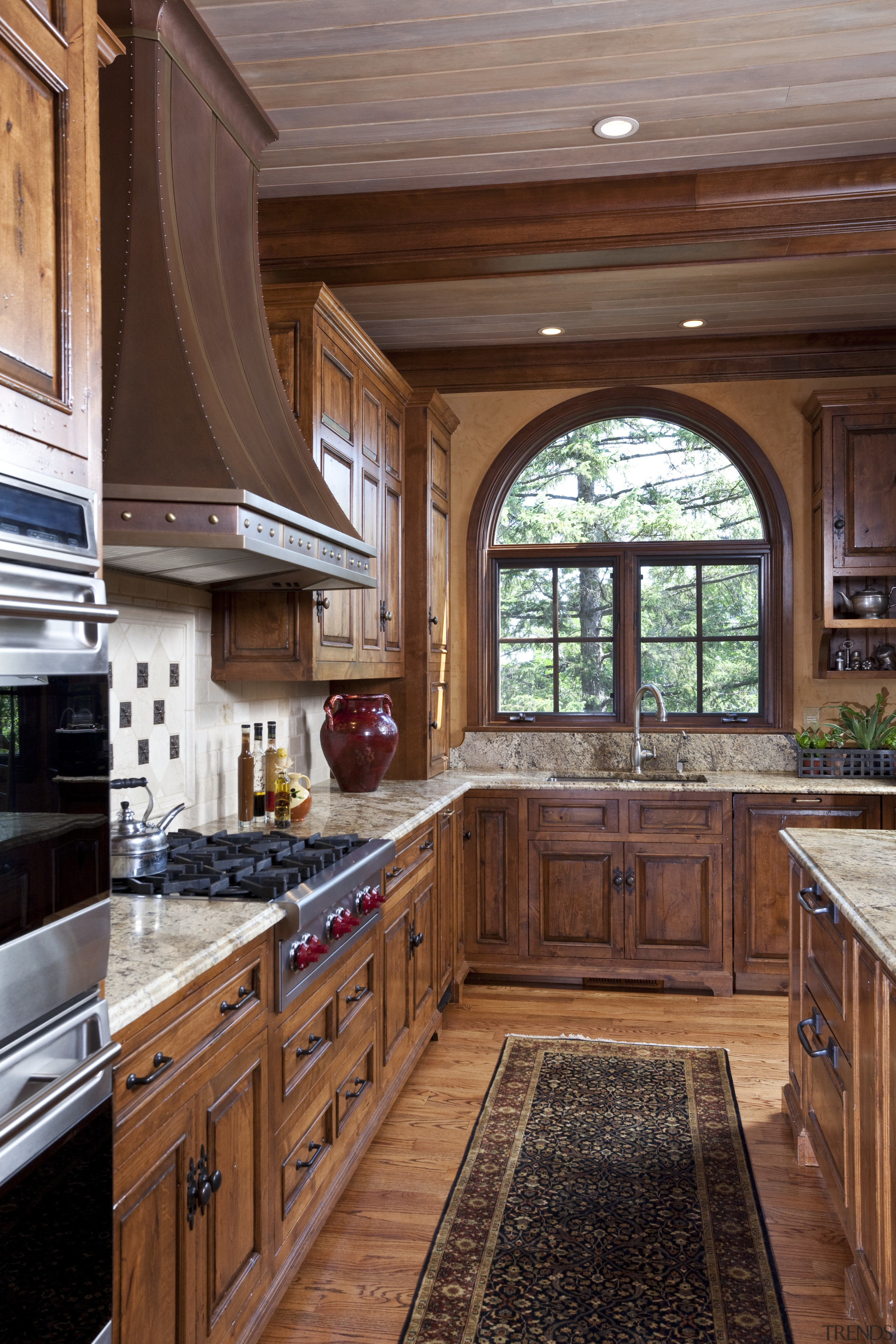 A view of a kitchen by Bruce Kading cabinetry, ceiling, countertop, cuisine classique, estate, flooring, hardwood, home, interior design, kitchen, real estate, room, window, wood, wood flooring, wood stain, brown