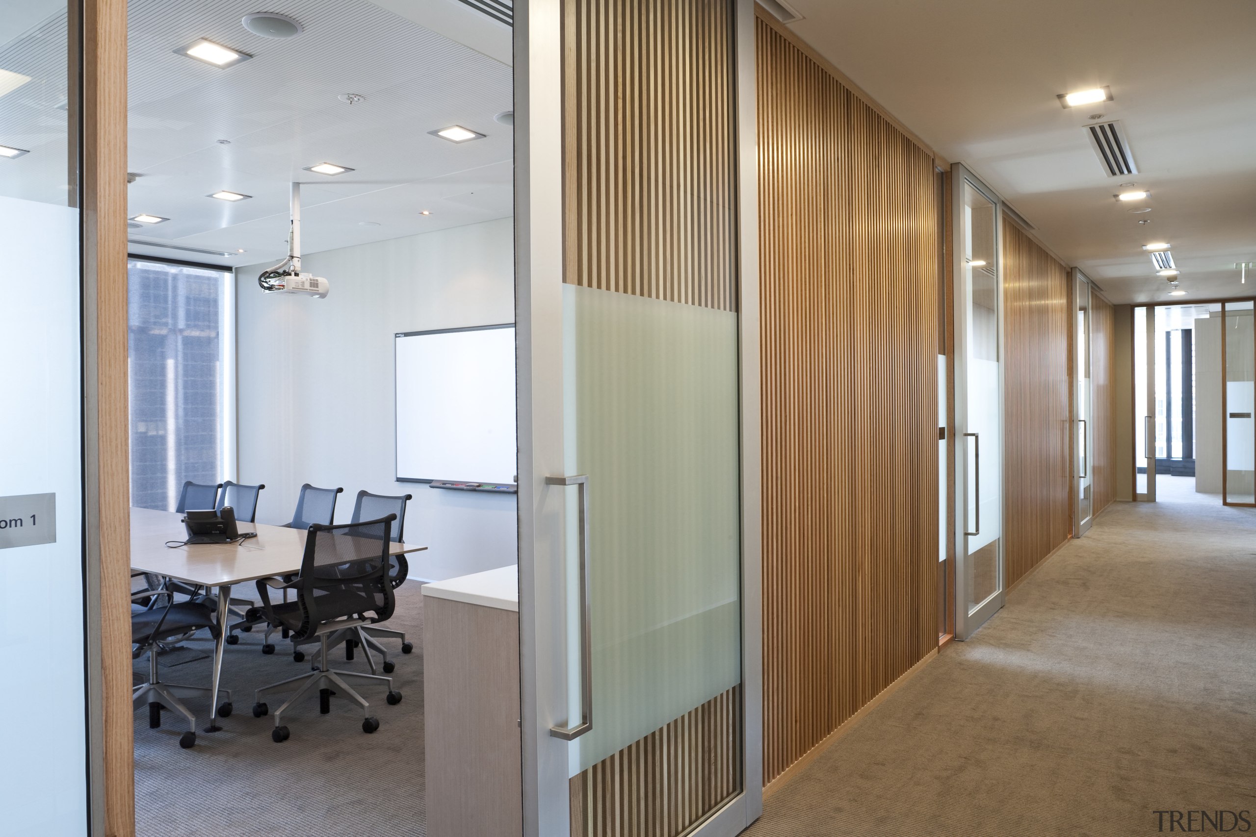 Interior view of the Deloitte offices where the architecture, ceiling, daylighting, glass, interior design, real estate, wall, window, gray, brown