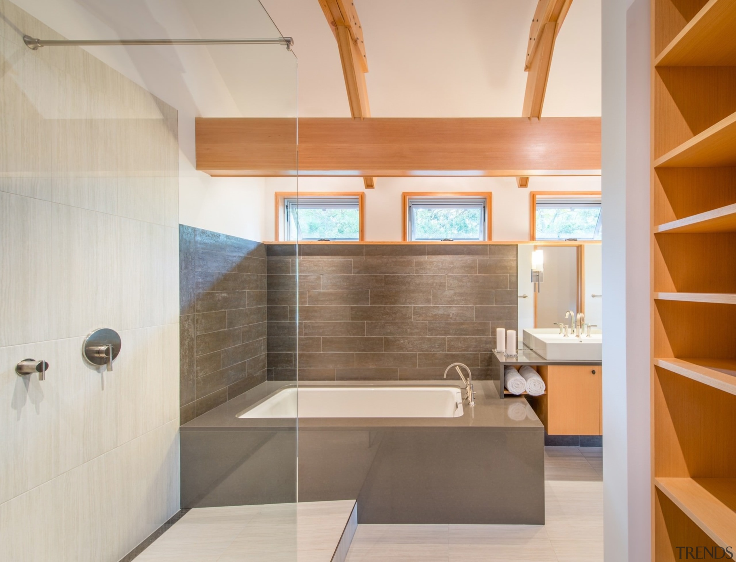 A spa-like bathtub in this large bathroom - architecture, bathroom, countertop, floor, interior design, real estate, wood, gray