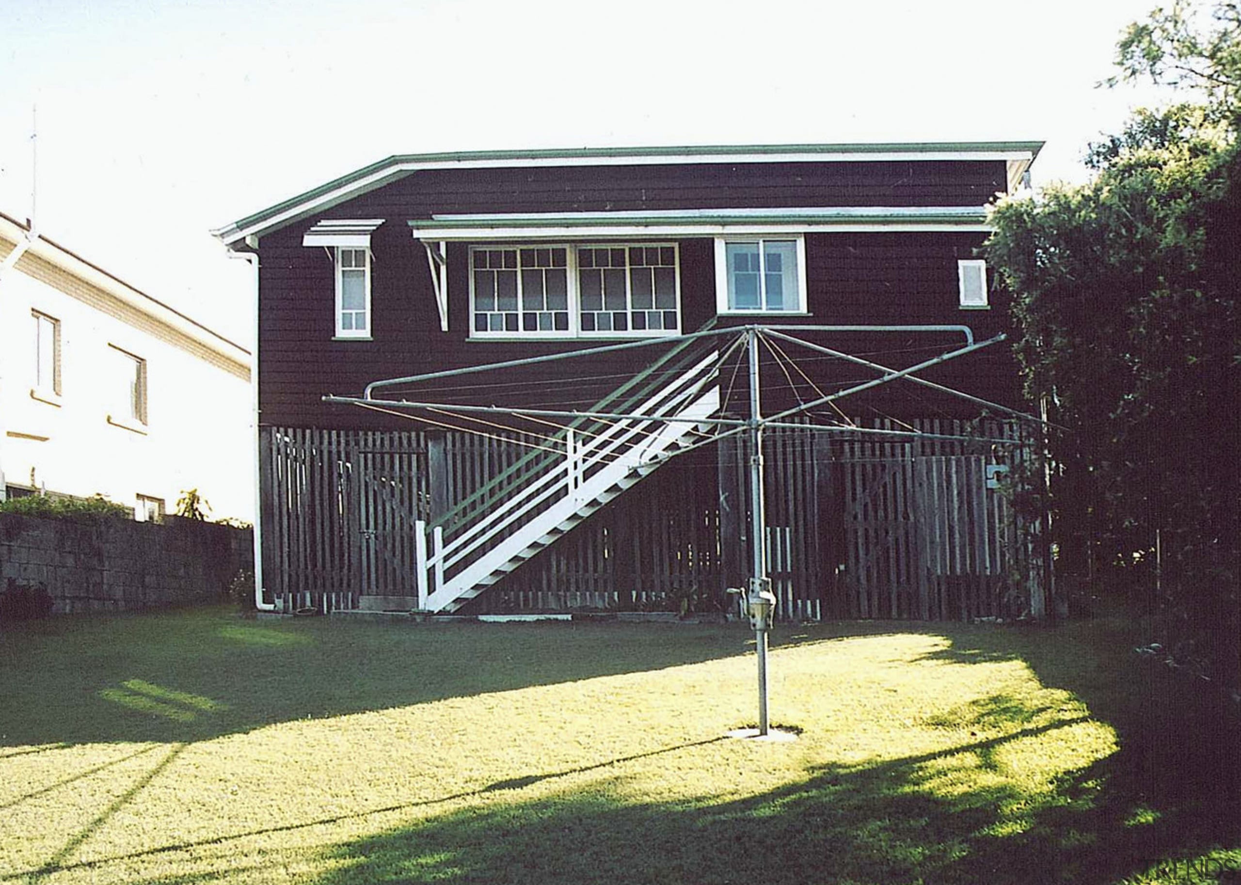 A view of the home before it was building, cottage, estate, facade, home, house, property, real estate, residential area, shed, siding, structure, white, black