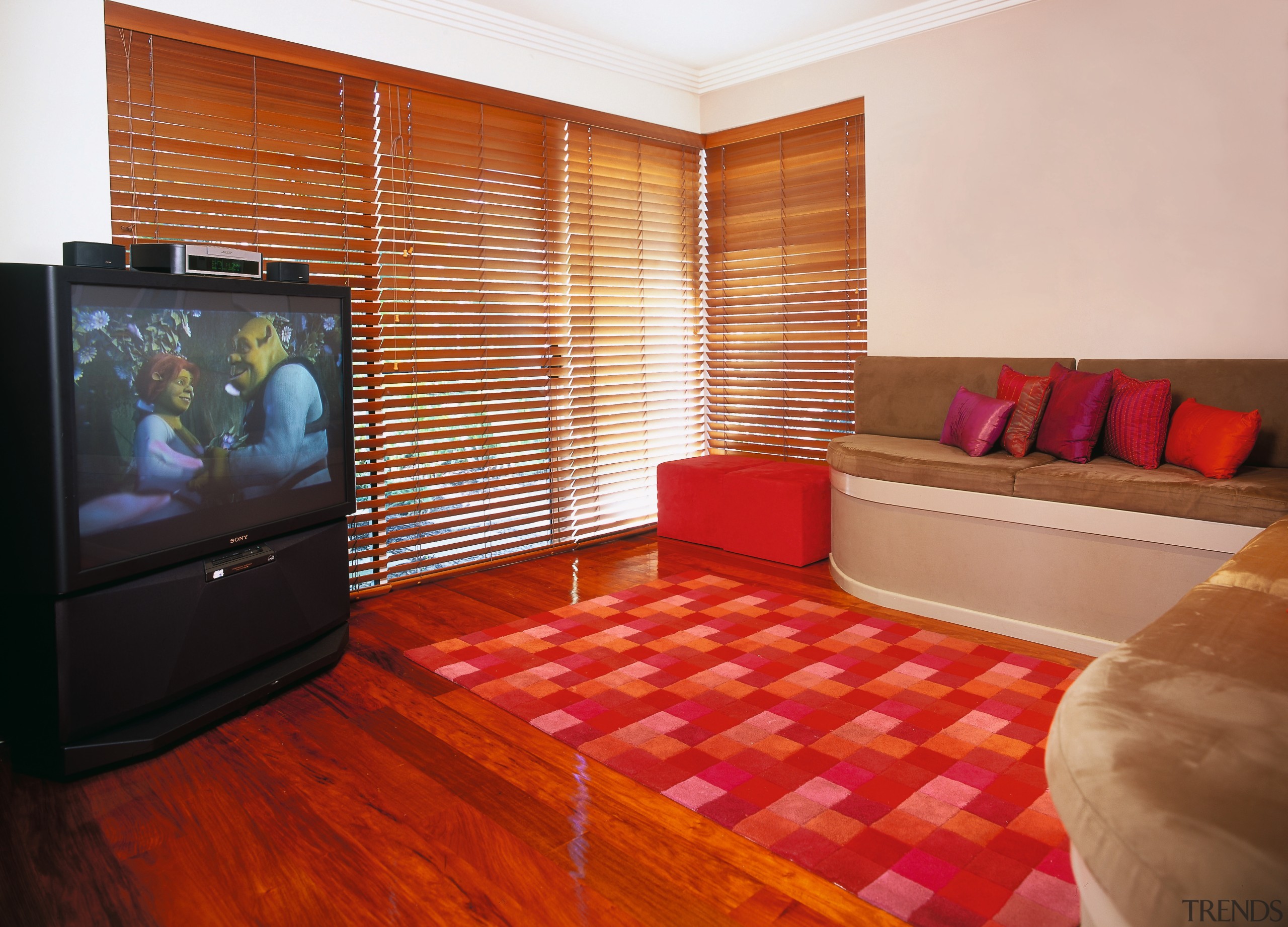 view of the lounge and home entertainment system floor, flooring, hardwood, interior design, laminate flooring, living room, property, real estate, room, suite, wood, wood flooring, red