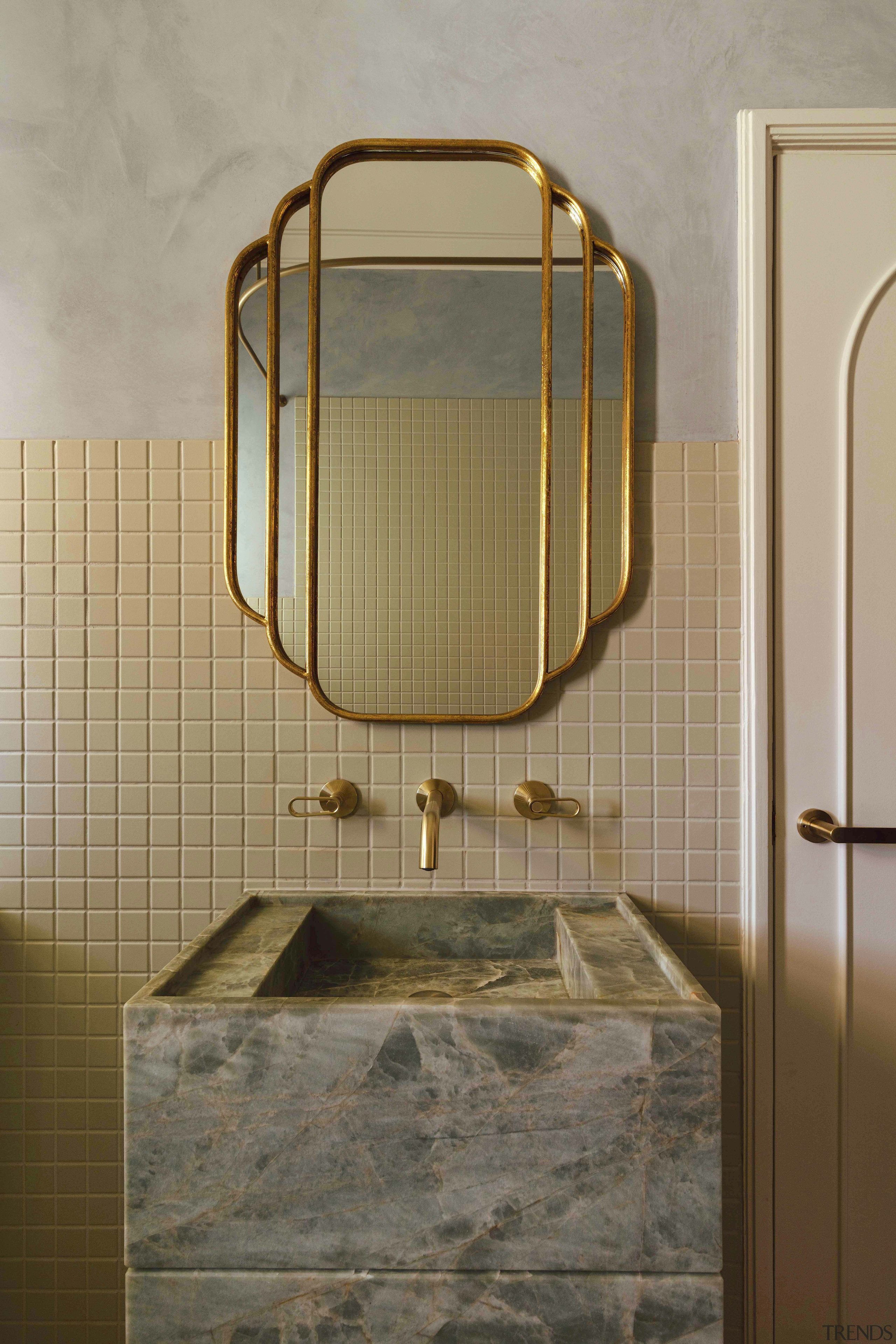 The custom vanity in Emerald Haze Quartzite designed 