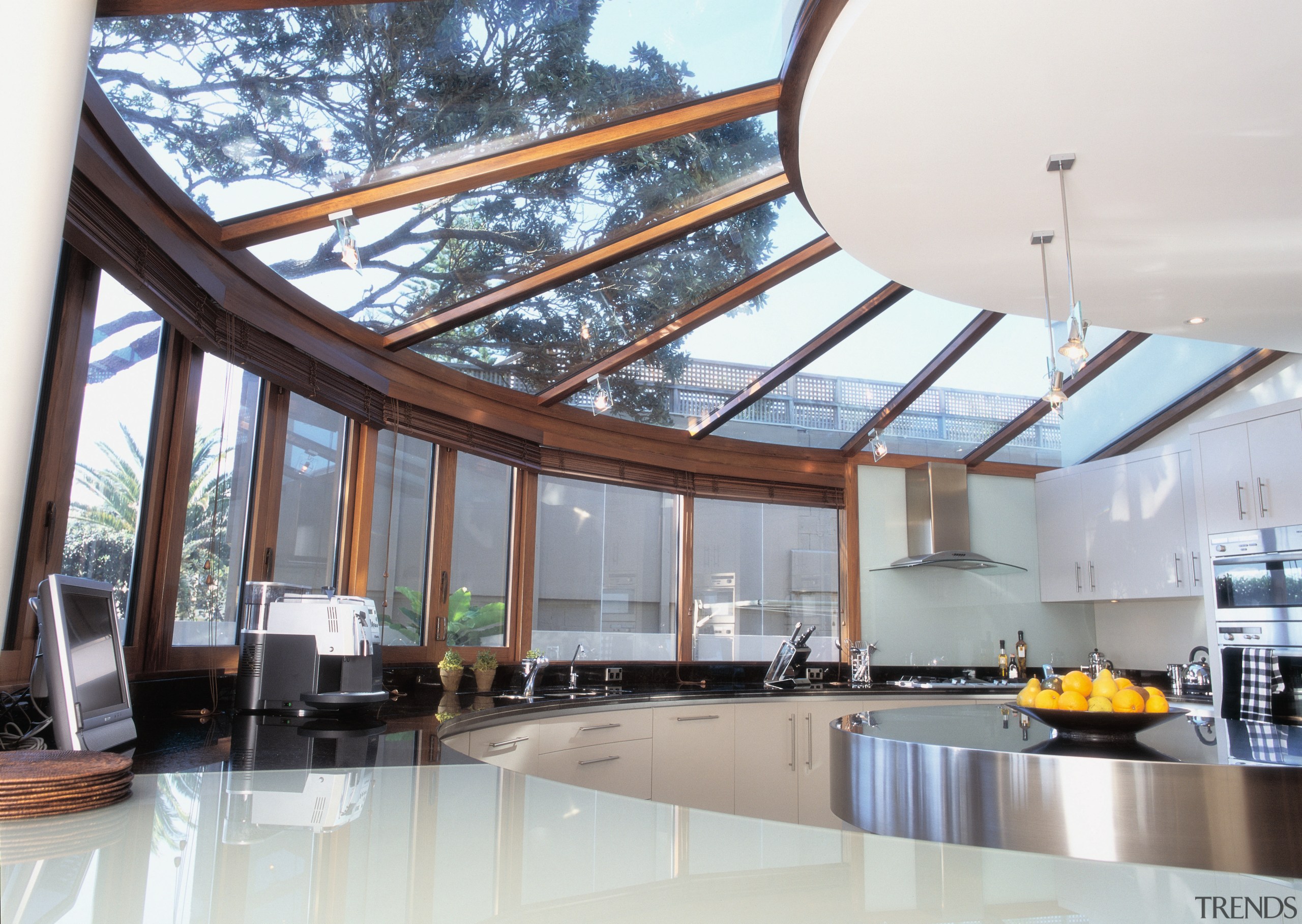 Circular shaped kitchen with windows and overhead glazing. ceiling, daylighting, interior design, real estate, roof, window, white, gray