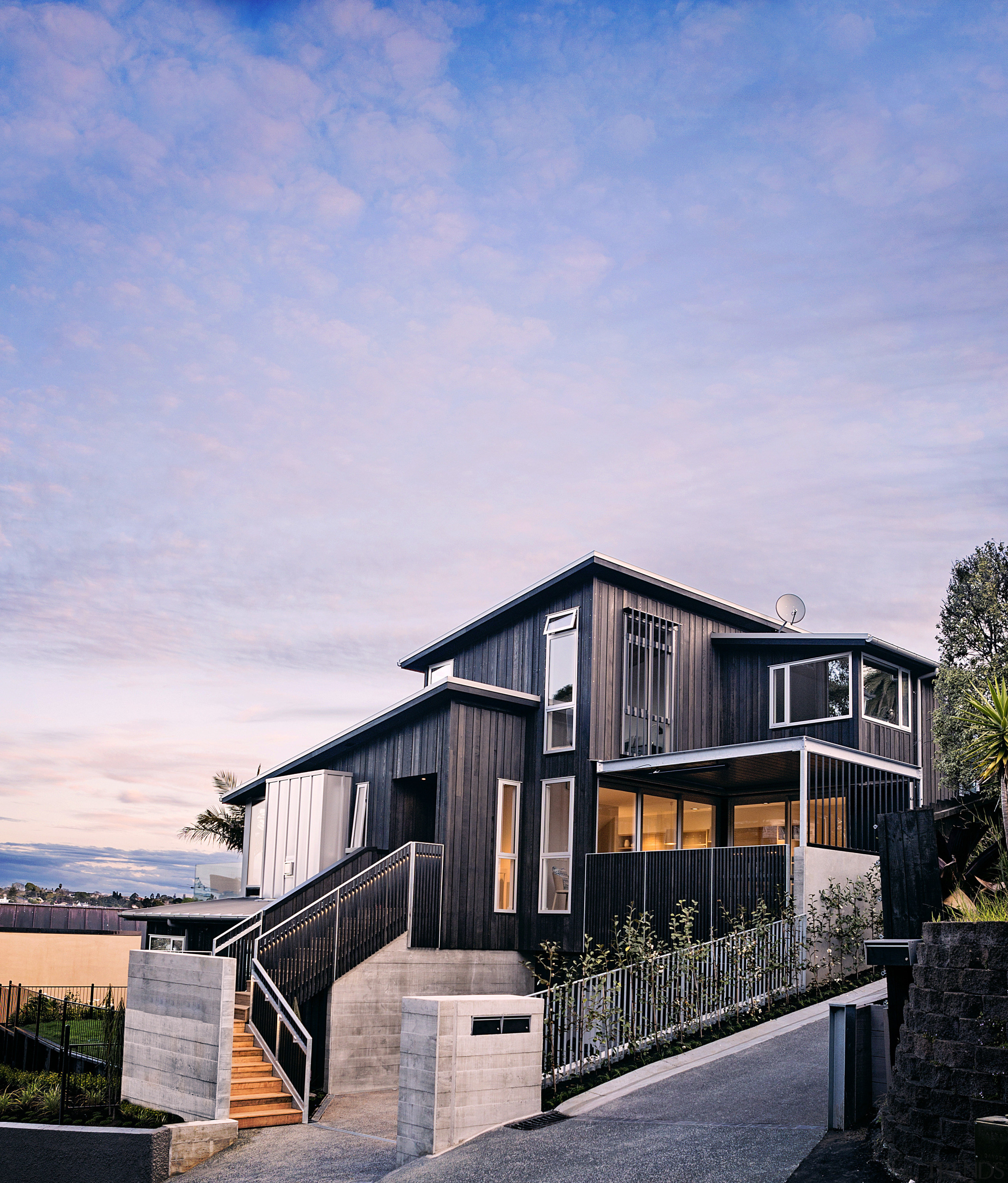 Designed by architect Robyn Bilkey and built by architecture, building, cottage, estate, facade, home, house, property, real estate, residential area, sky, purple