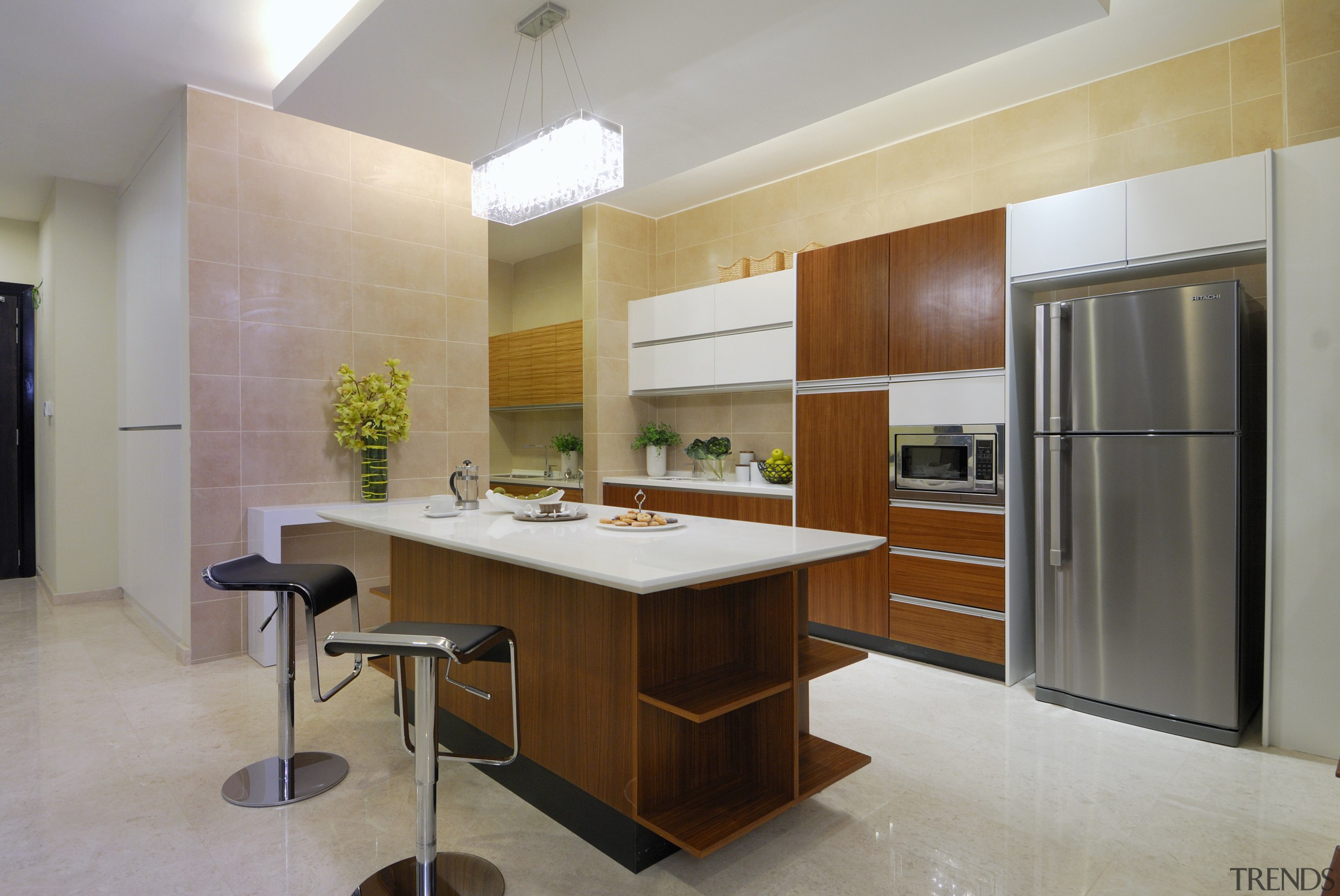 View of kitchen which features a kitchen island cabinetry, countertop, cuisine classique, interior design, kitchen, real estate, room, gray