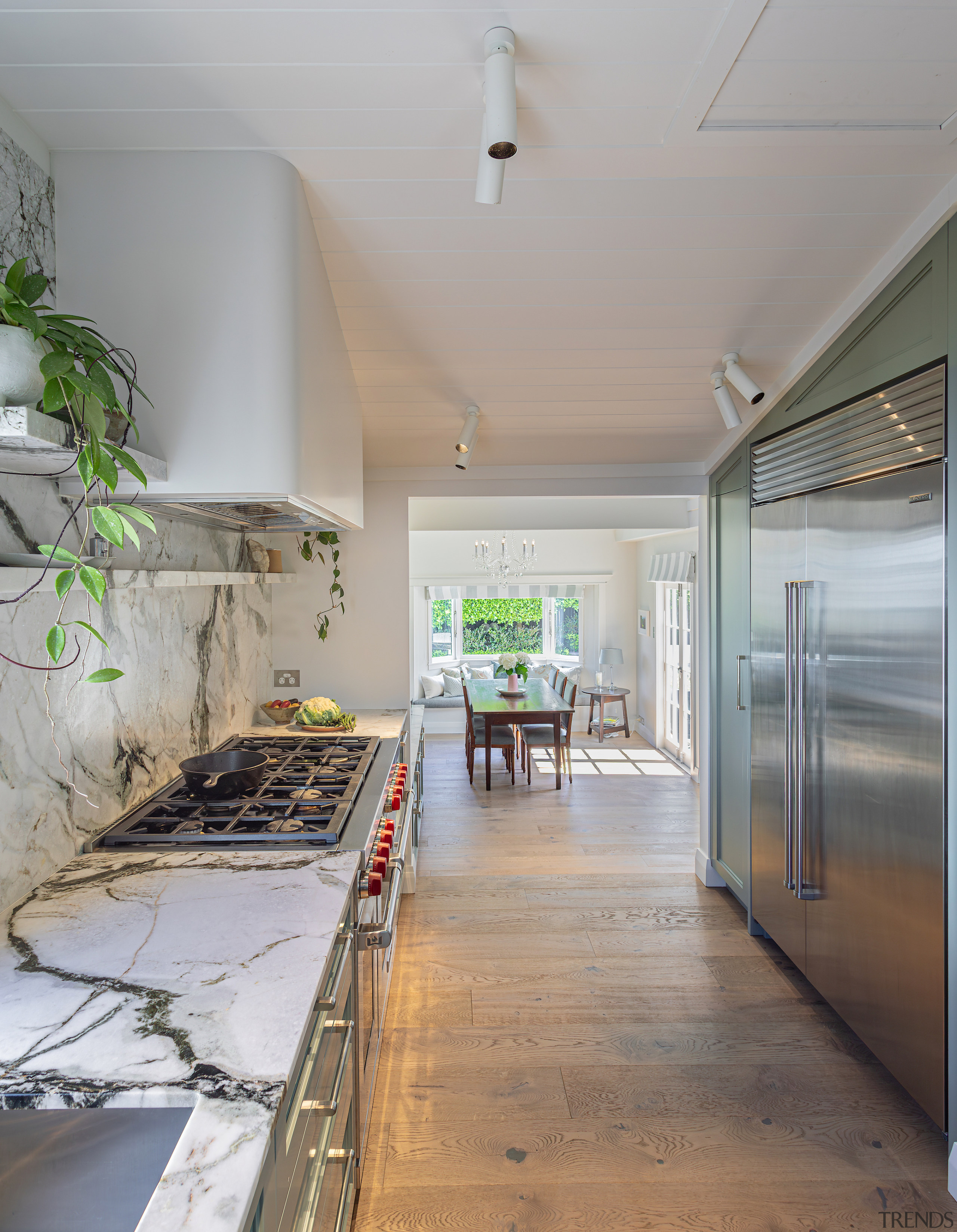 The flowing kitchen connects to the open-plan living 