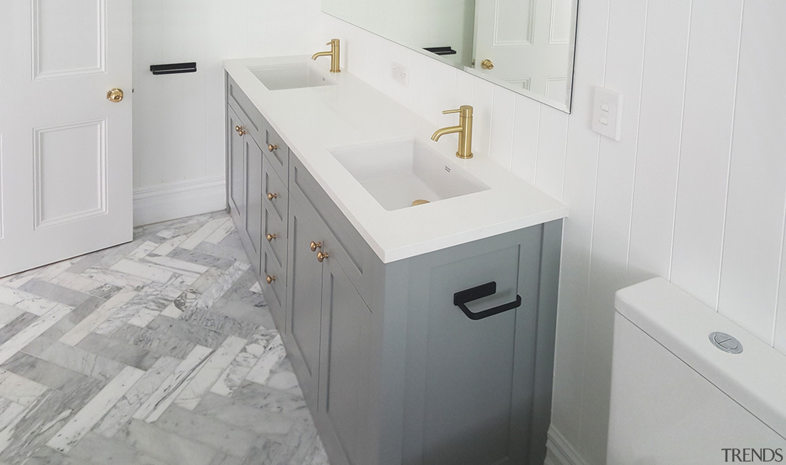 A marble border in the shower floor is bathroom, bathroom accessory, bathroom cabinet, bathroom sink, floor, plumbing fixture, room, sink, tap, tile, white, gray