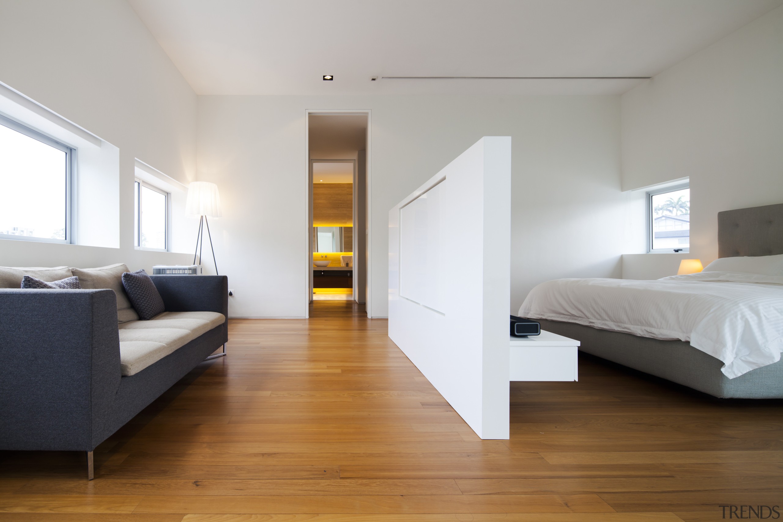 A few simple, assertive design strokes can transform architecture, bed, bed frame, bedroom, ceiling, daylighting, floor, flooring, furniture, hardwood, house, interior design, laminate flooring, real estate, room, suite, wood, wood flooring, gray