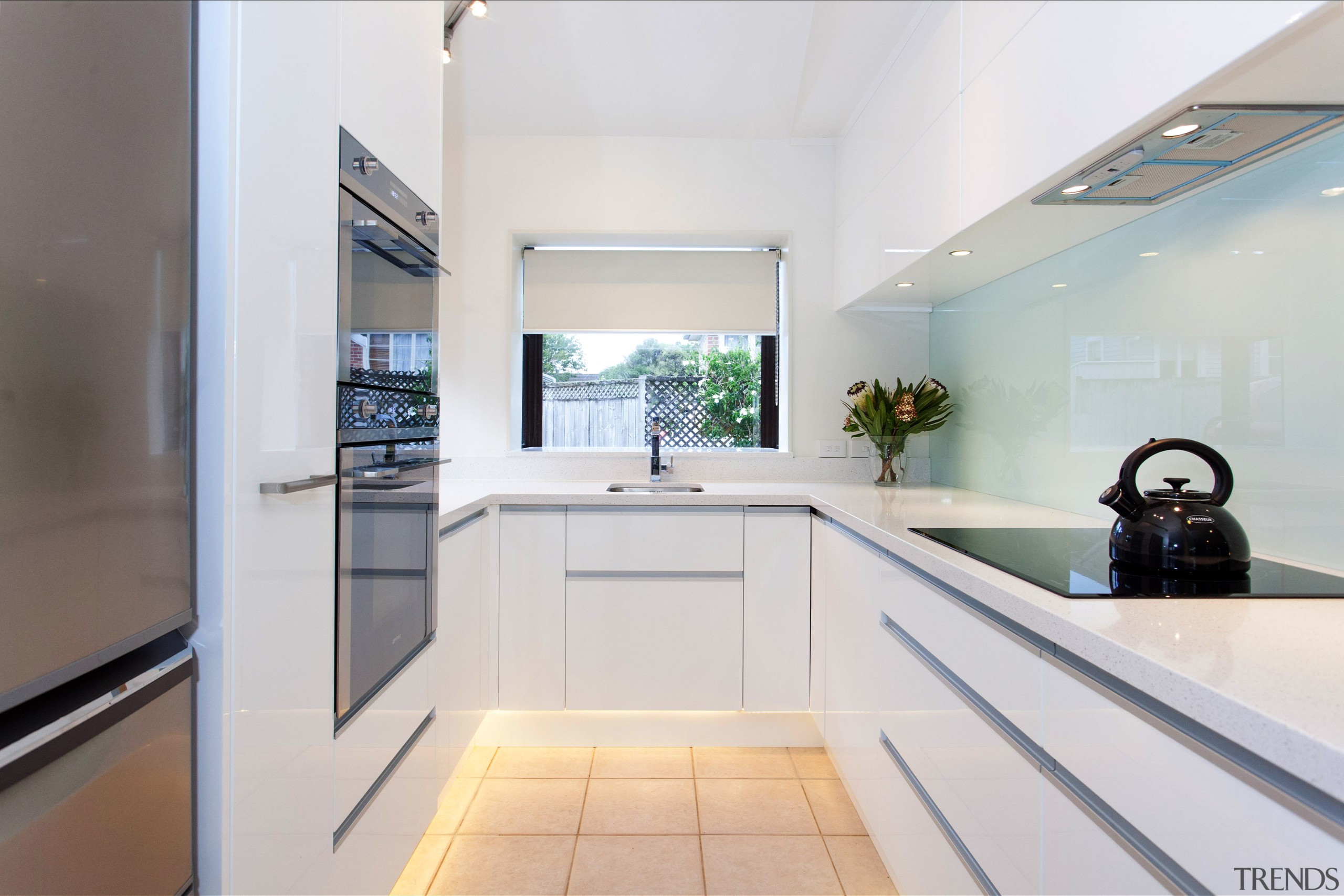 This small kitchen was completely transformed by kitchen architecture, countertop, estate, home, interior design, kitchen, property, real estate, white, gray