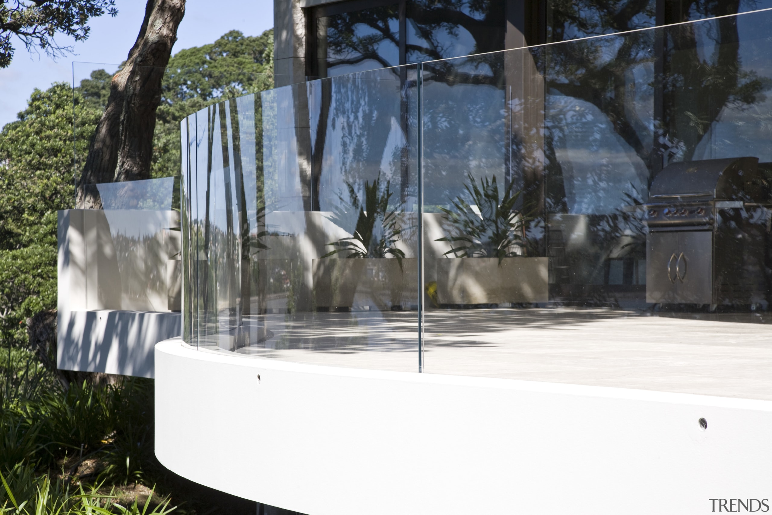 Exterior view of A Waterside house made of tree, water, white