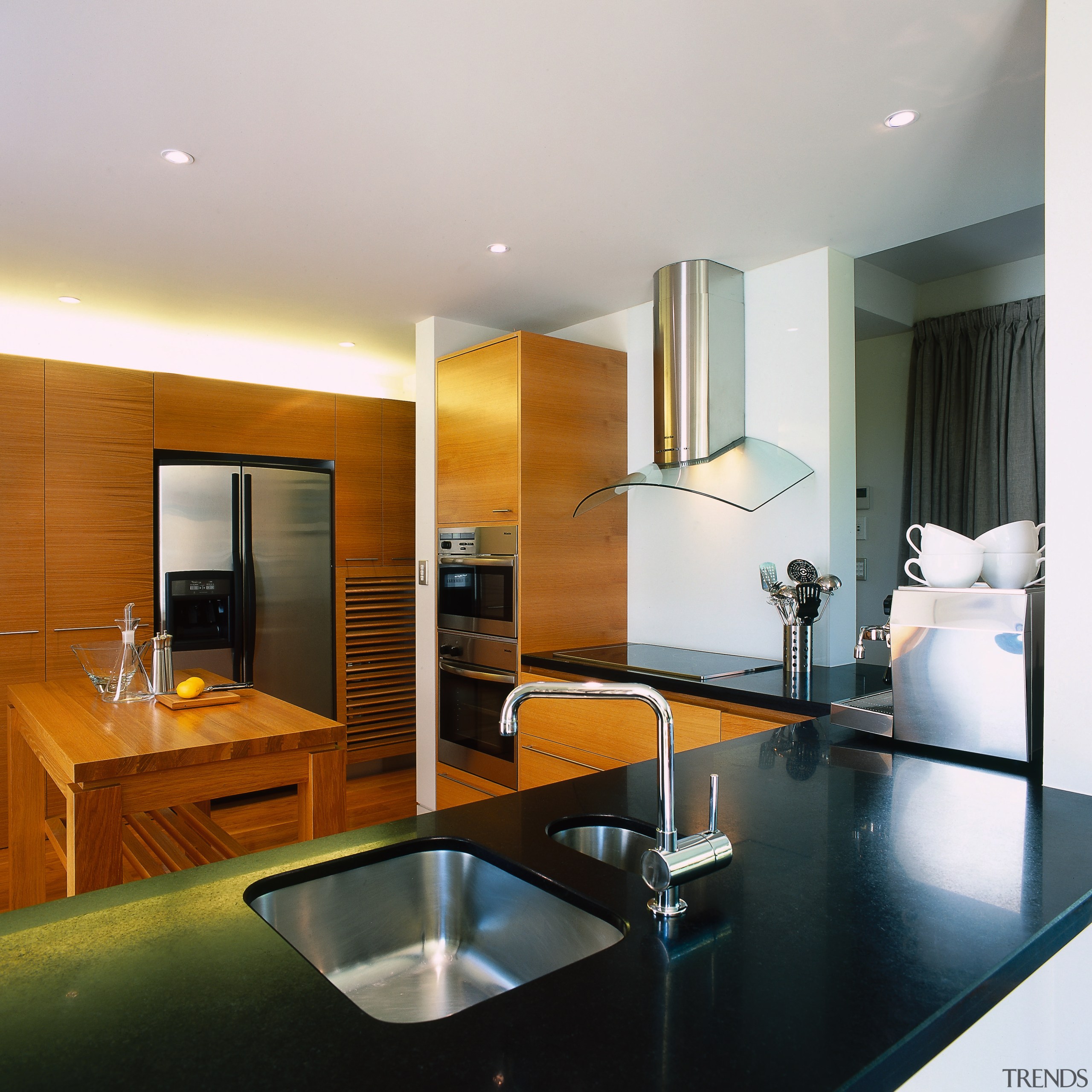 view of the kitchen area showing granite benchtops, architecture, ceiling, condominium, countertop, floor, interior design, kitchen, living room, real estate, room, gray