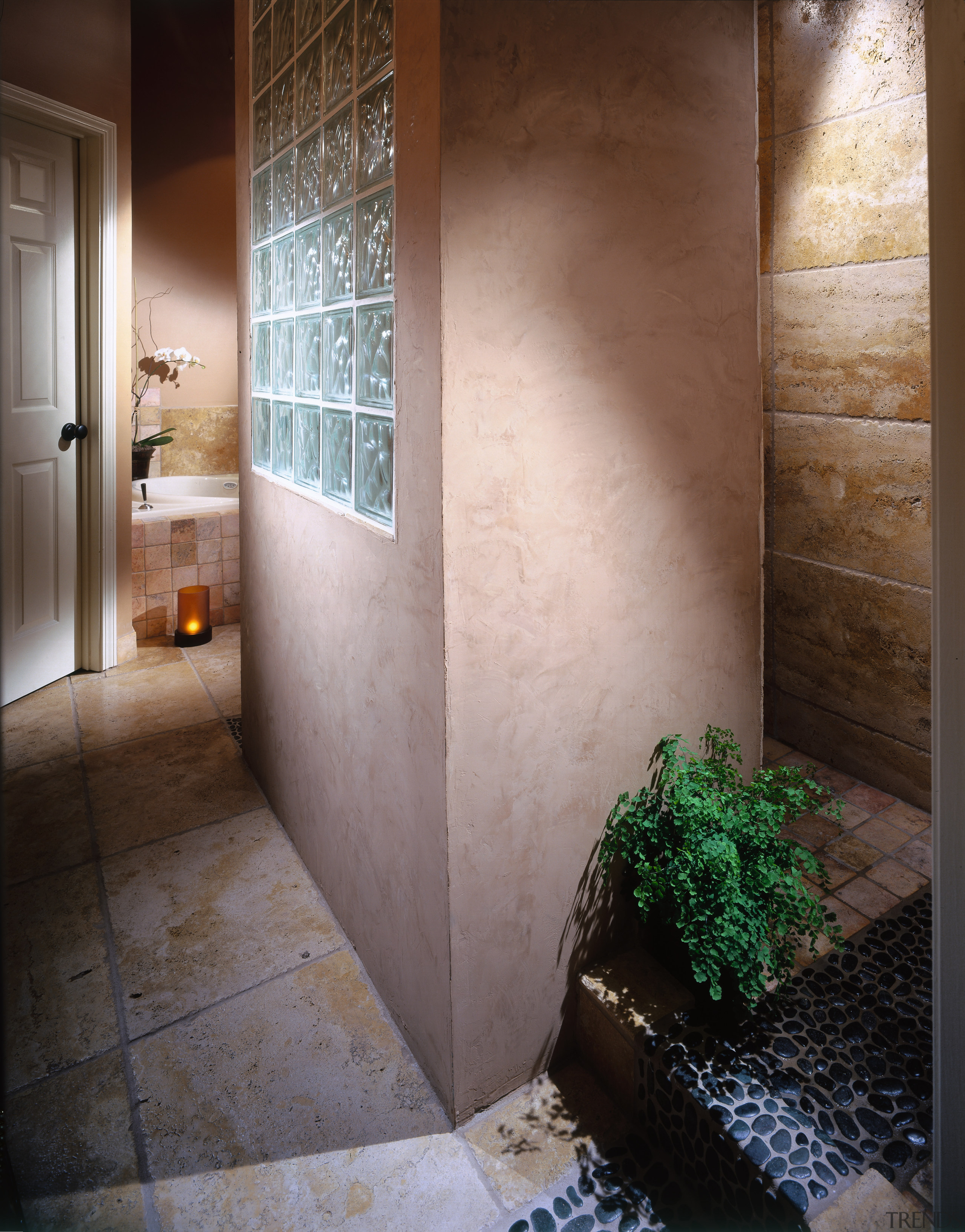 A view of the glass block wall. - architecture, daylighting, door, floor, flooring, glass, home, house, interior design, room, tile, wall, window, wood, gray, brown