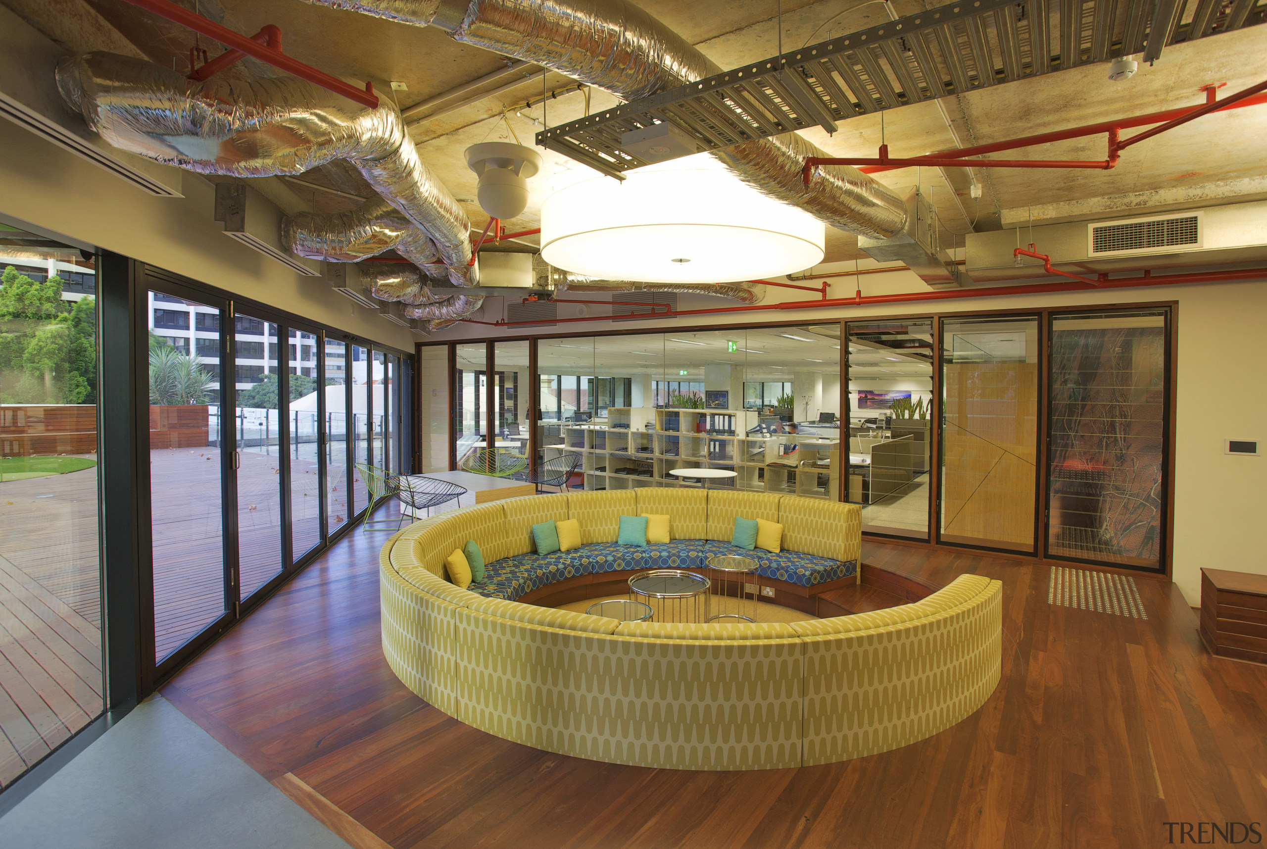 Interior with wooden floor and curved yellow seat interior design, real estate, brown