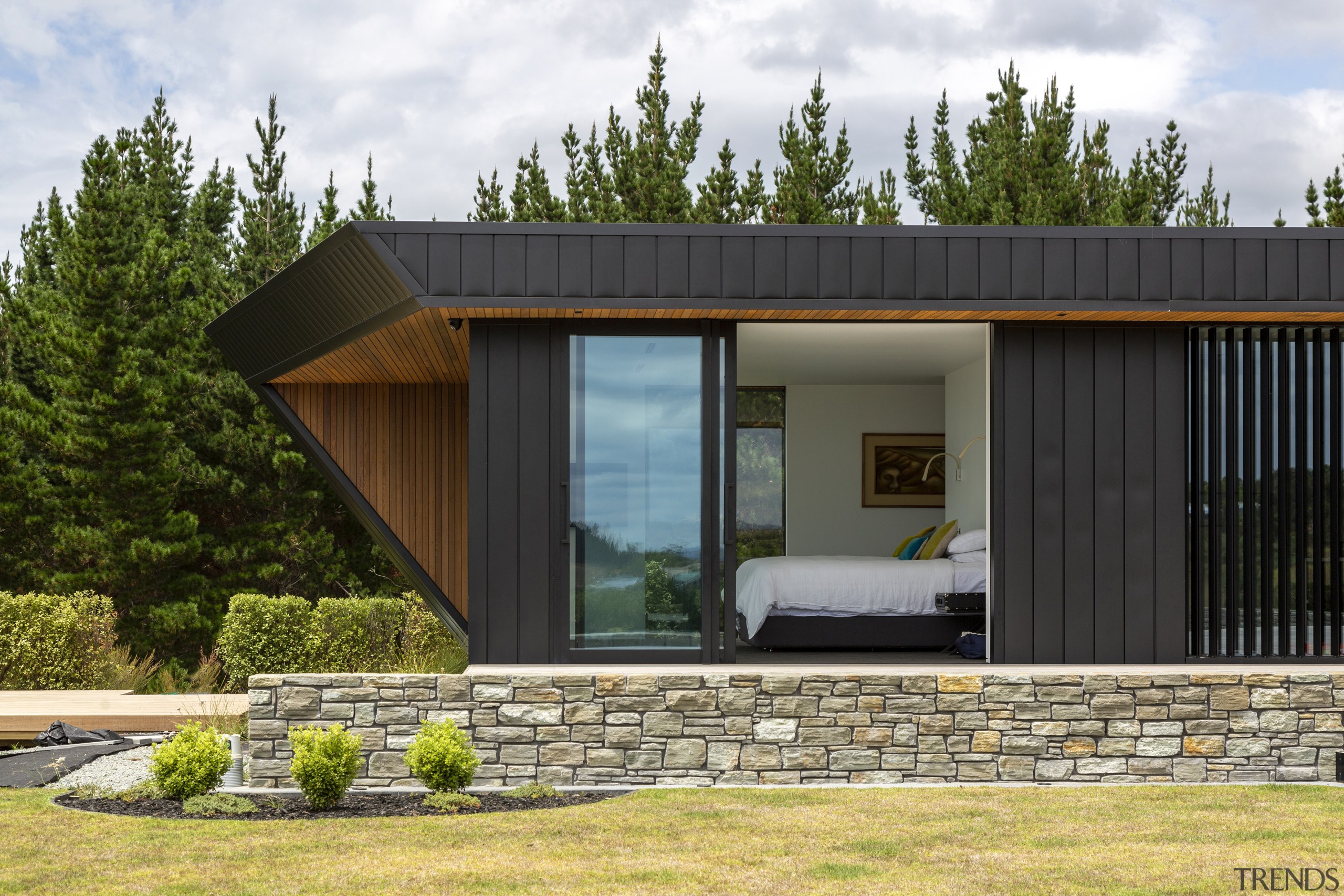 The bedroom wing also opens up to the 