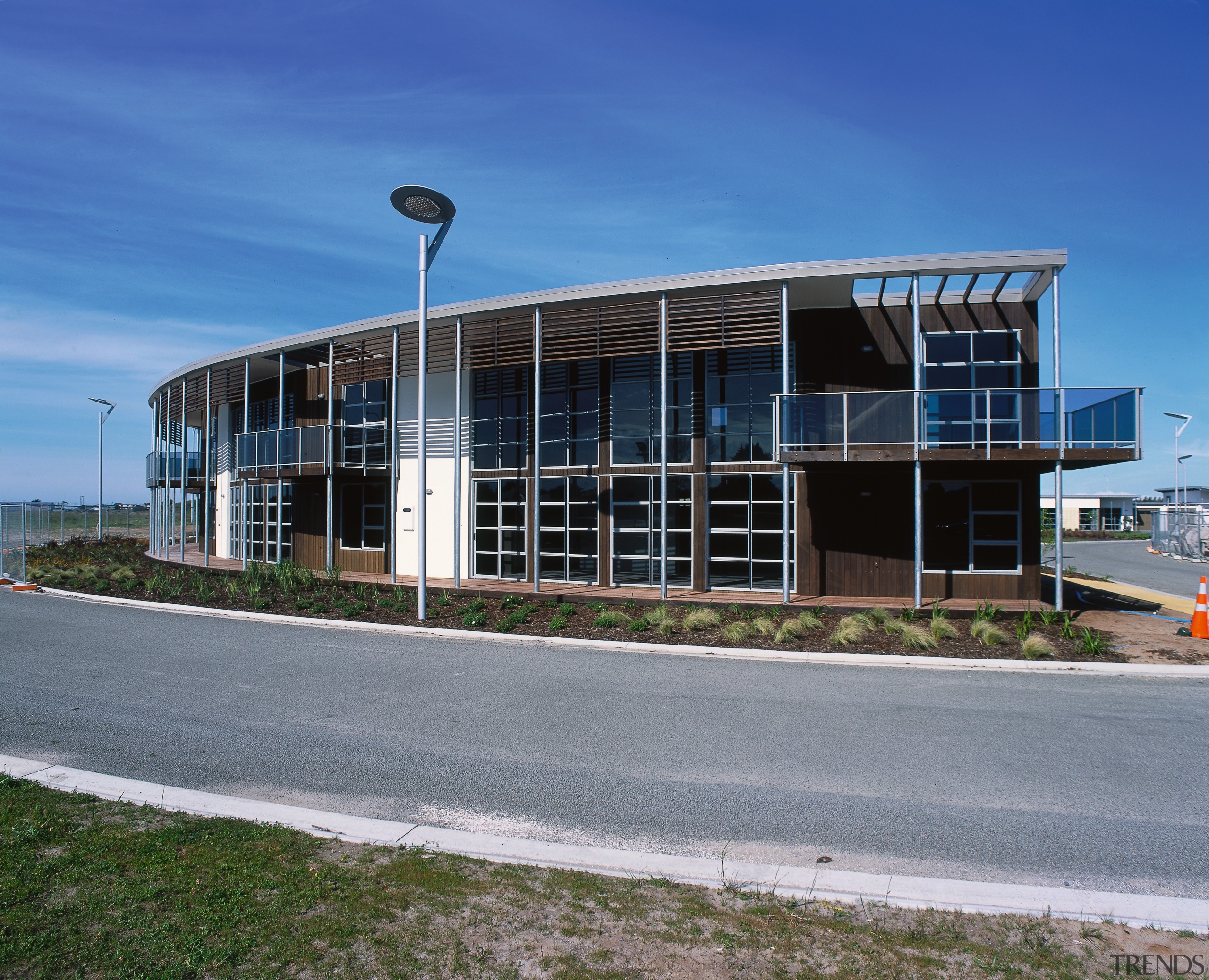 An exterior view of the retirement village. - architecture, building, commercial building, corporate headquarters, headquarters, real estate, sky, structure, blue, gray