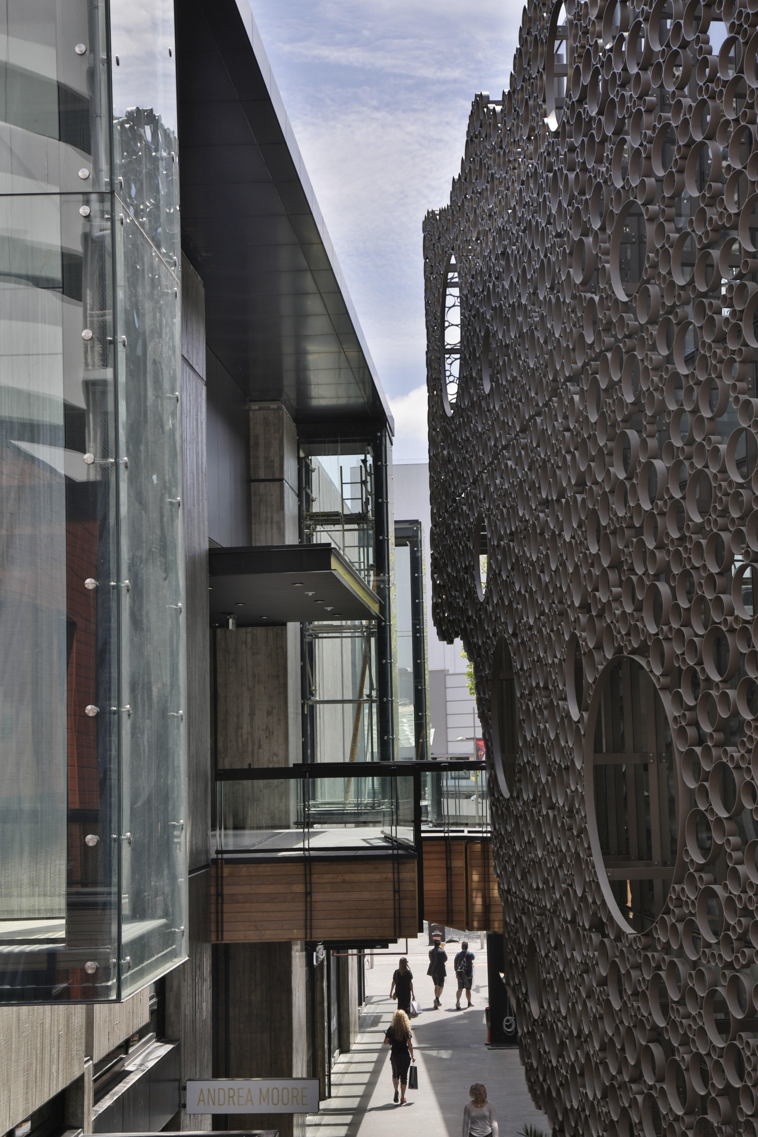 First floor shops and walkways offer glimpses into architecture, building, black, gray