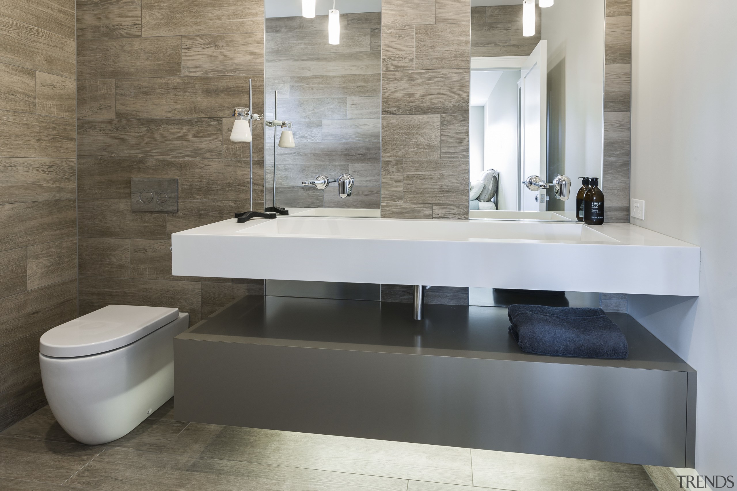 The look of timber plank tiles is matched bathroom, bathroom sink, ceramic, countertop, floor, flooring, interior design, plumbing fixture, product design, sink, tap, tile, gray