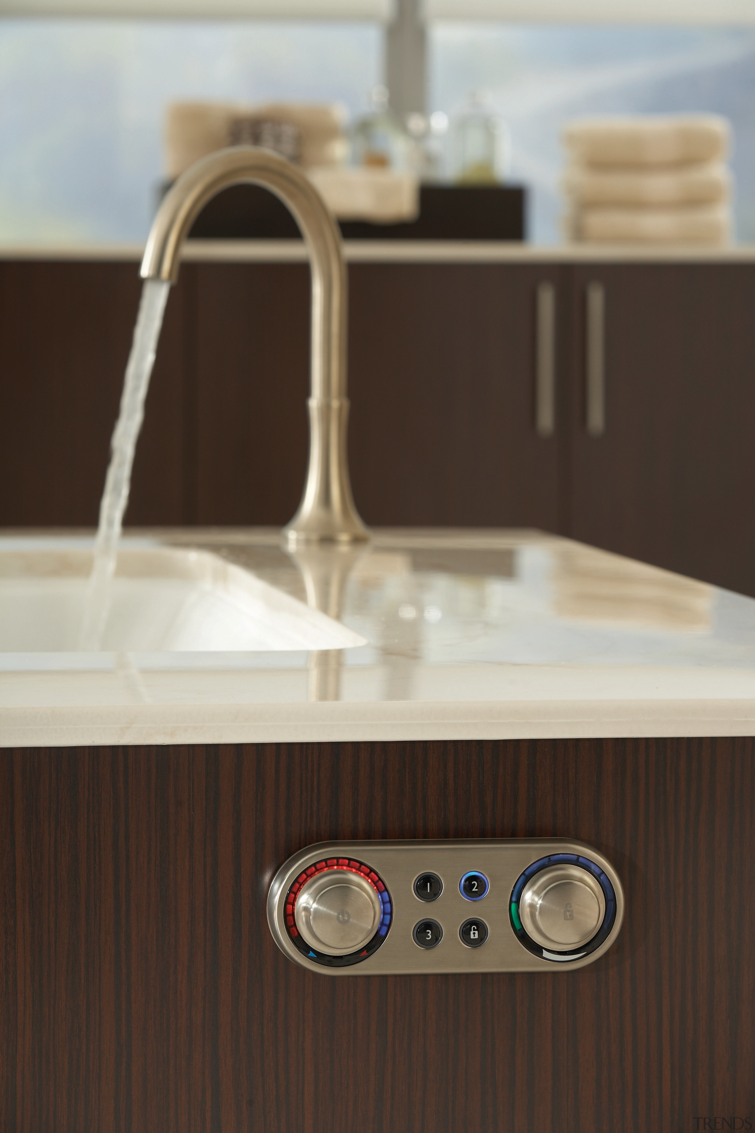 View of digital controller as part of Moen's product design, sink, tap, black, gray