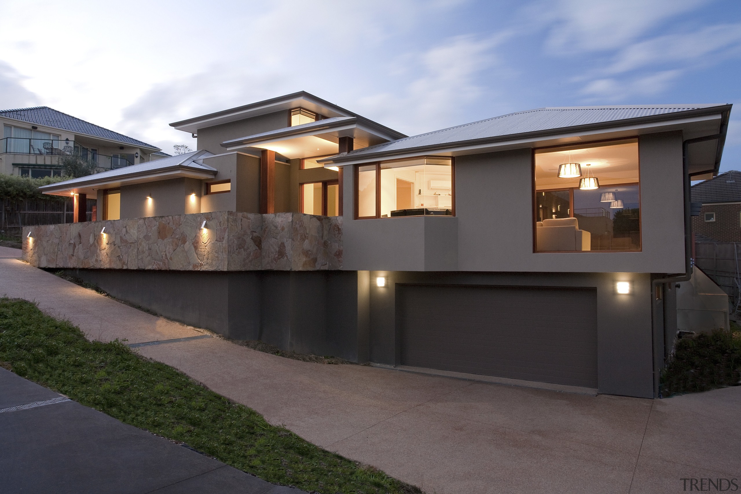 Exterior view of east facing house and driveway. architecture, building, elevation, estate, facade, family car, home, house, luxury vehicle, property, real estate, residential area, roof, window, black