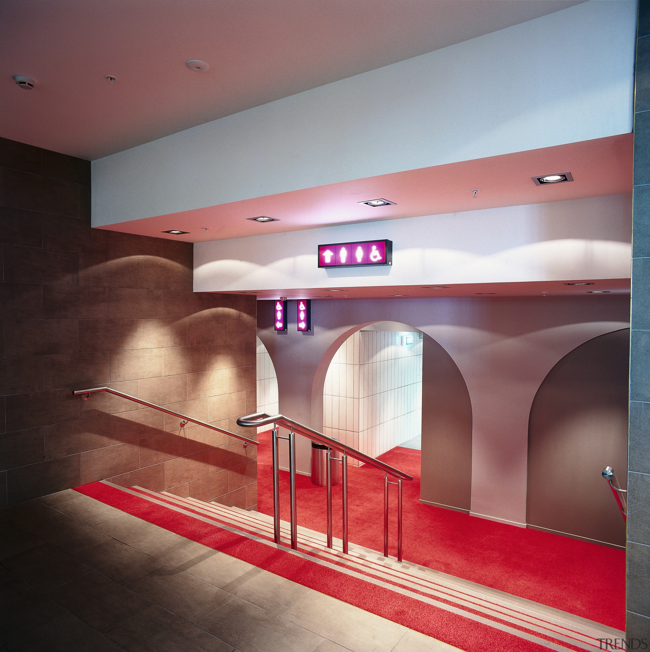 Stair area of theatre with red flooring and architecture, ceiling, floor, interior design, wall, red, gray