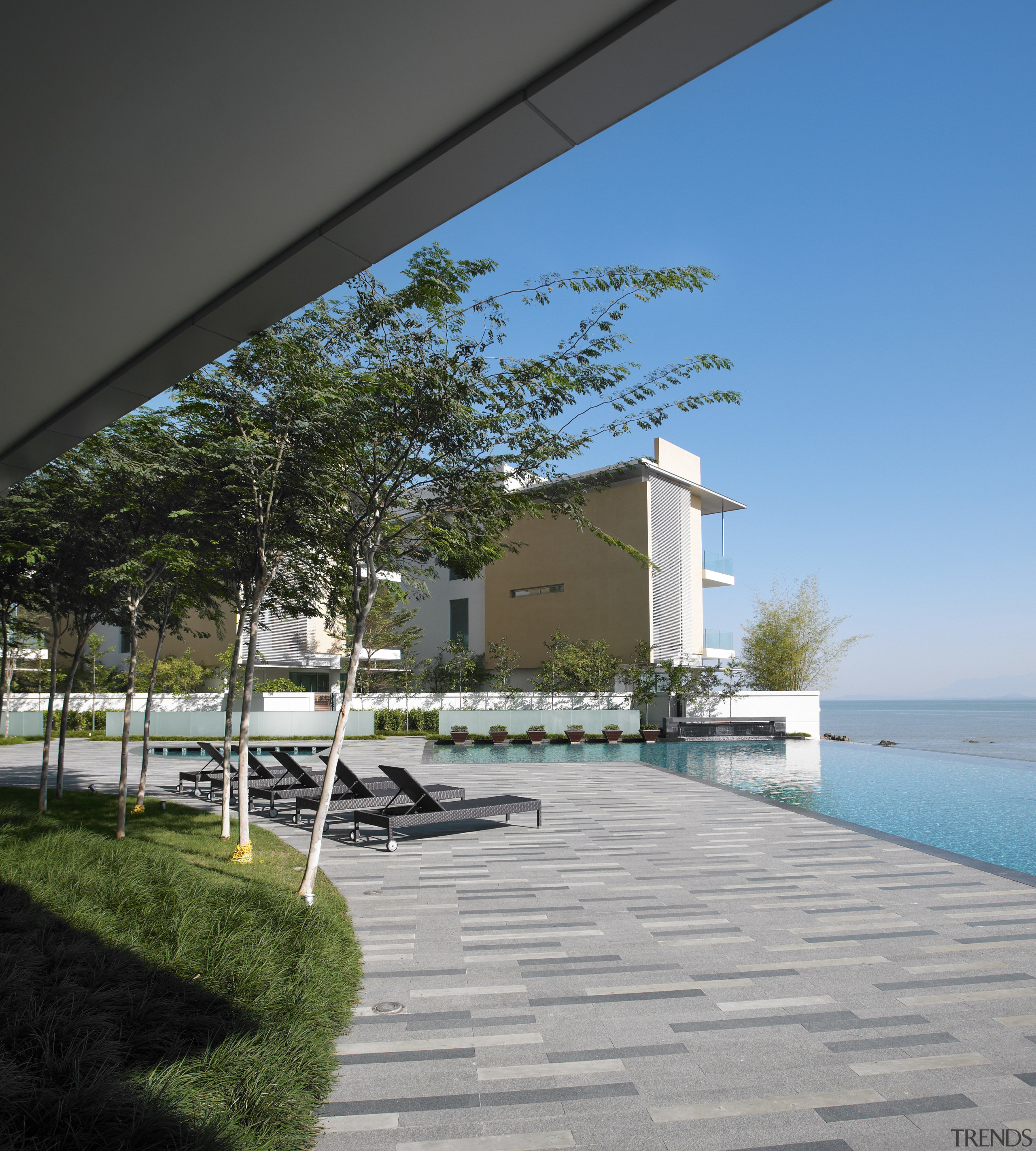 Exterior view of the Springtide Residence on Penang architecture, condominium, estate, home, house, property, real estate, residential area, sky, walkway, gray