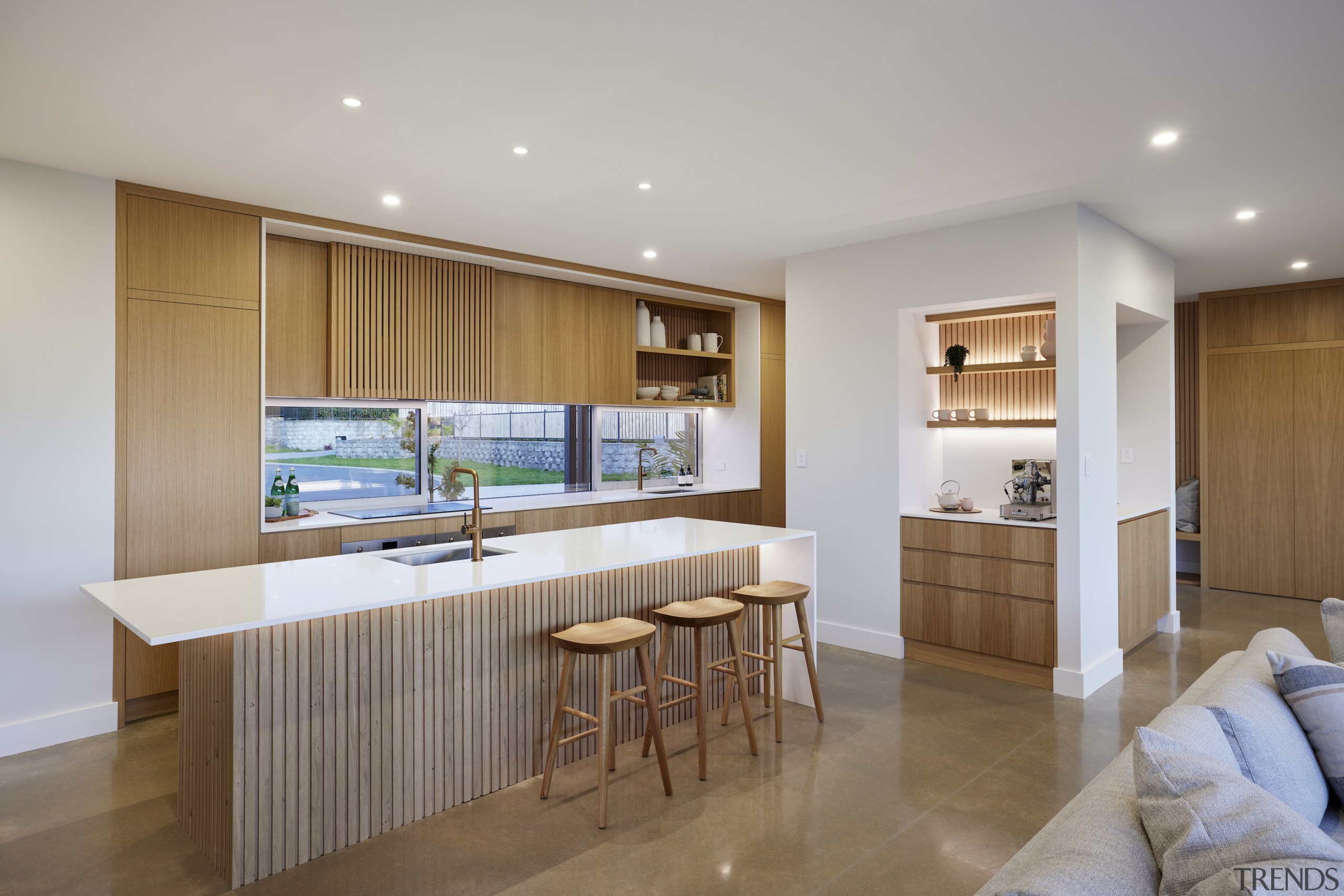 Designer kitchen with walk-in scullery tucked in behind 