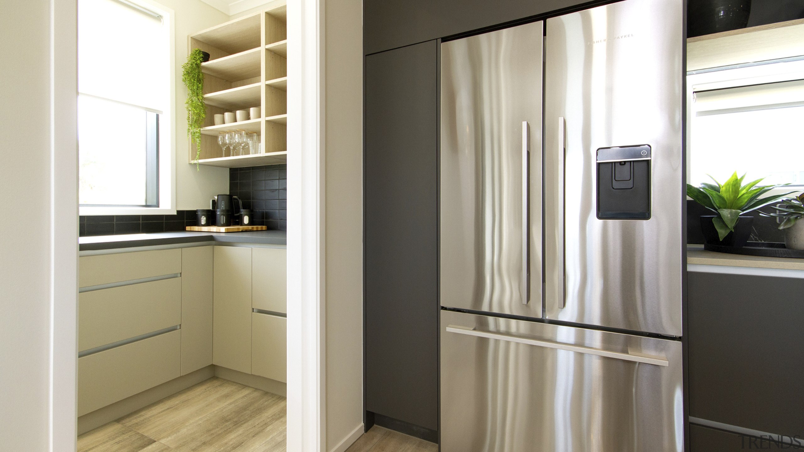 The generous, light-filled scullery includes both closed cabinetry 