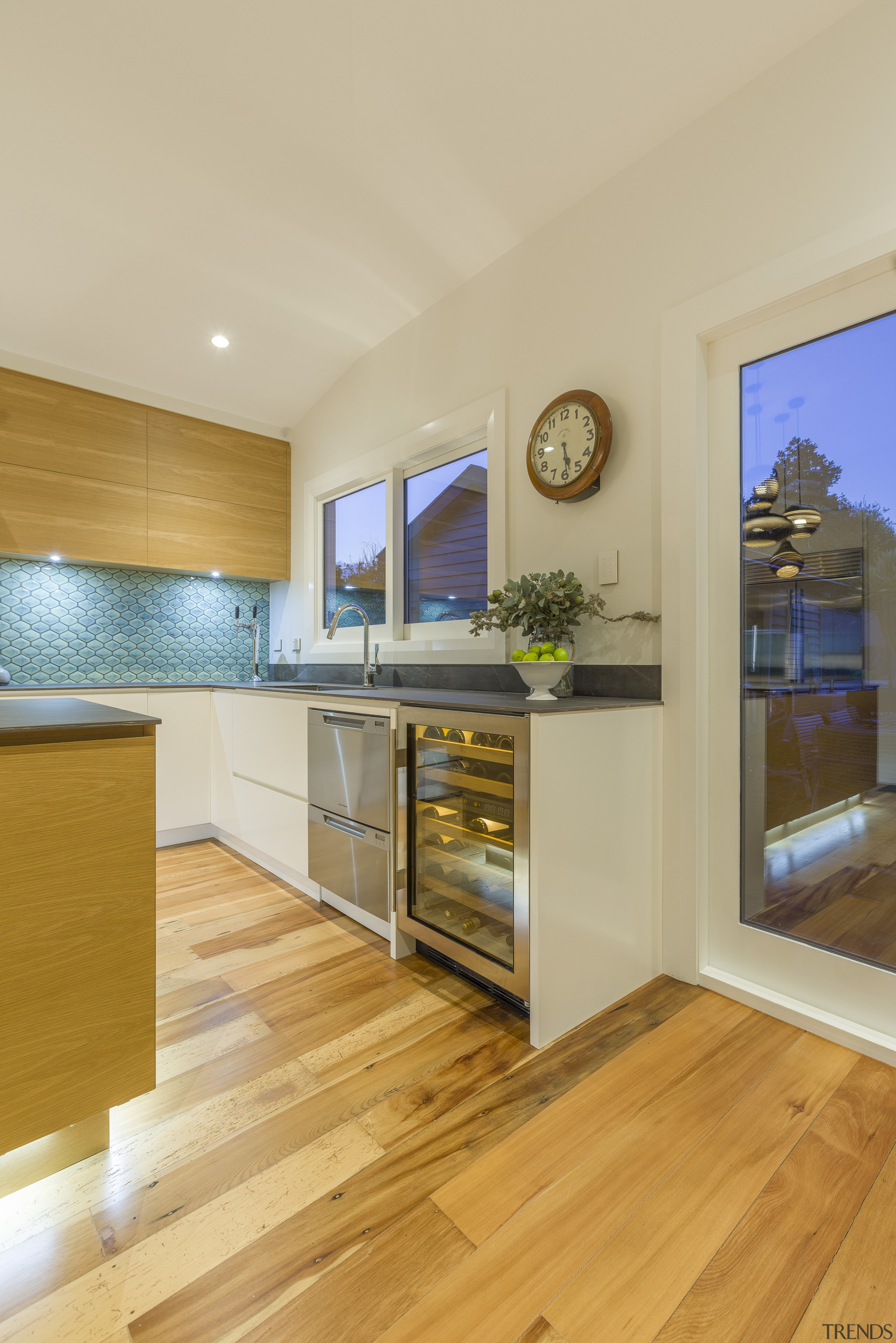 A step away from the door to the architecture, building, cabinetry, ceiling, countertop, daylighting, floor, flooring, furniture, hardwood, home, house, interior design, kitchen, laminate flooring, plywood, property, real estate, room, wood, wood flooring, yellow, orange