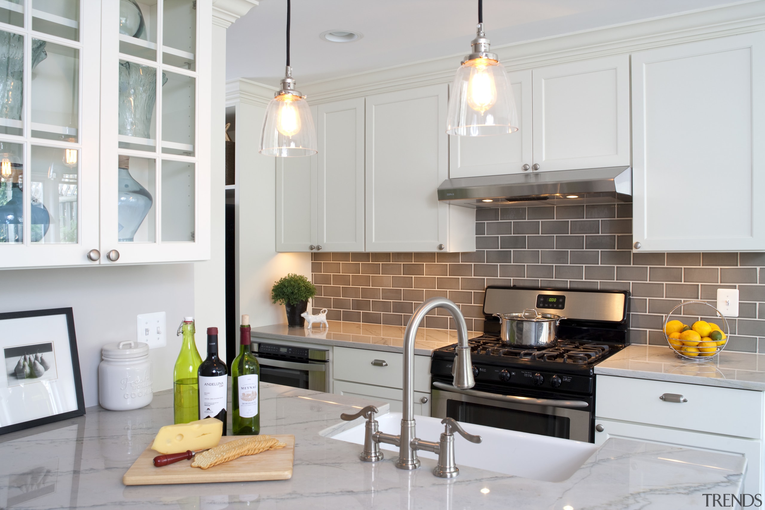 Gray tiles on the backsplash complement the white countertop, cuisine classique, home, interior design, kitchen, room, white