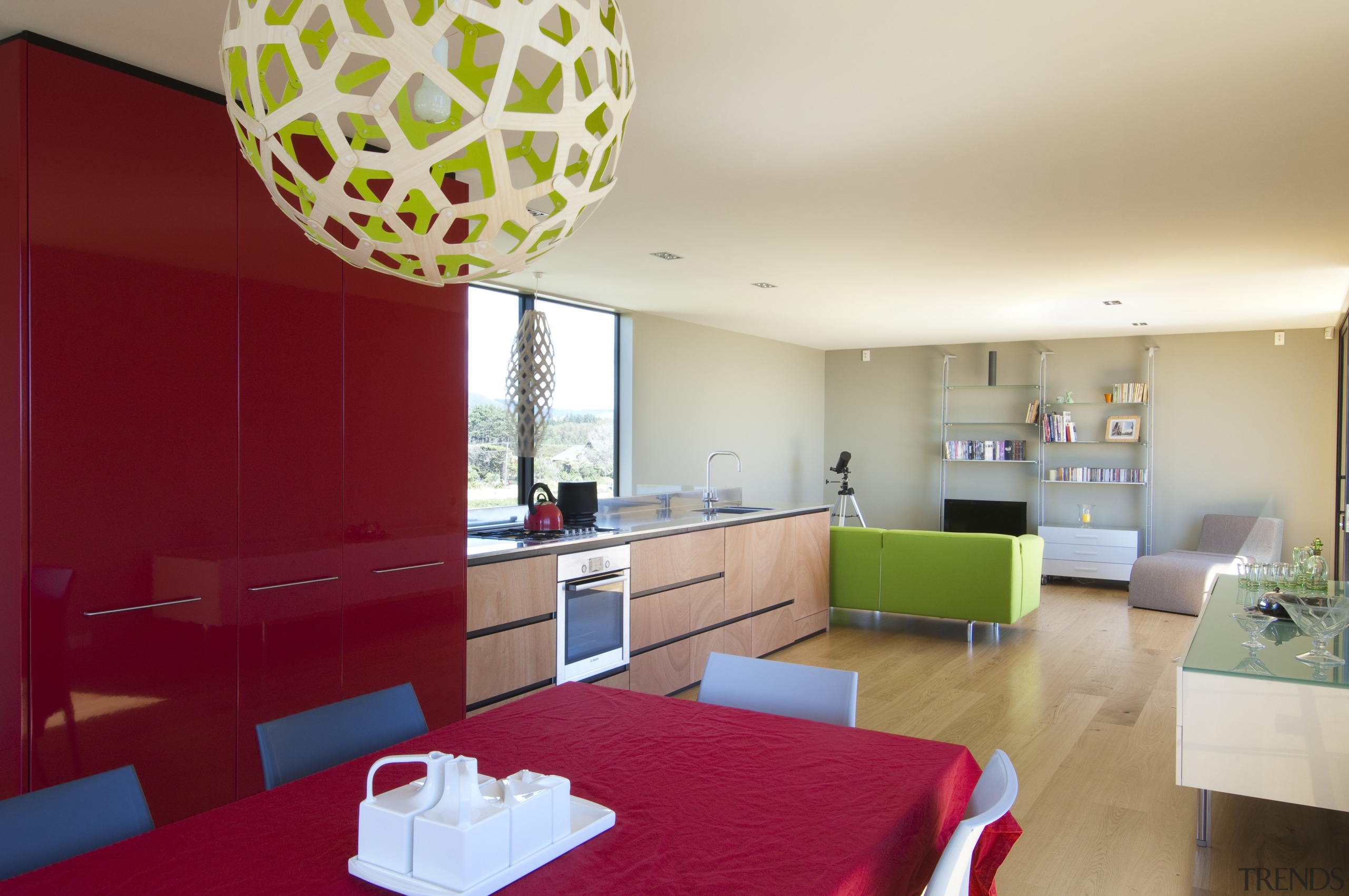 View of dining area with red table and apartment, architecture, ceiling, home, house, interior design, living room, real estate, room, table, red, white