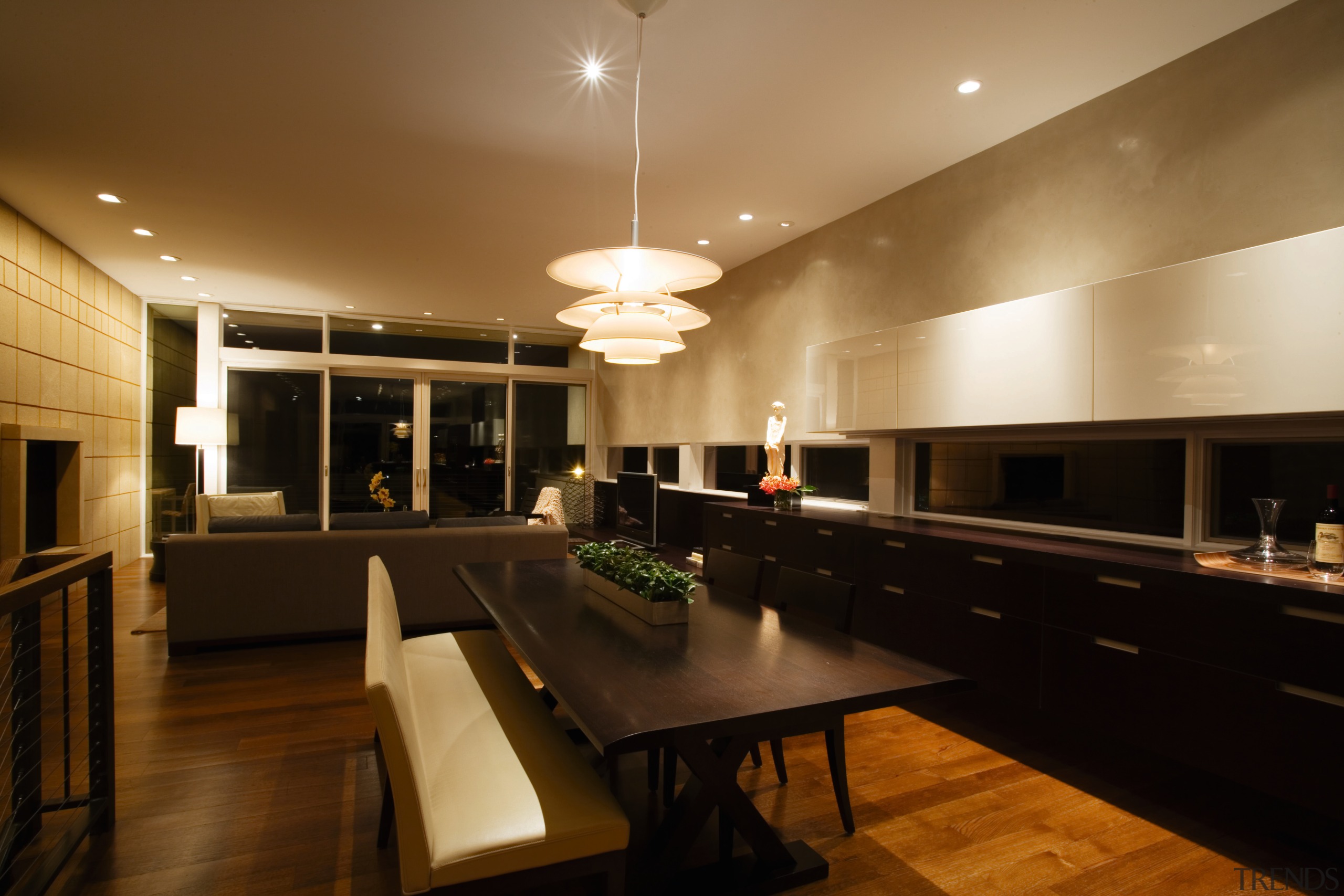 view of his kitchen featuring home automation products ceiling, dining room, interior design, kitchen, lighting, real estate, table, brown