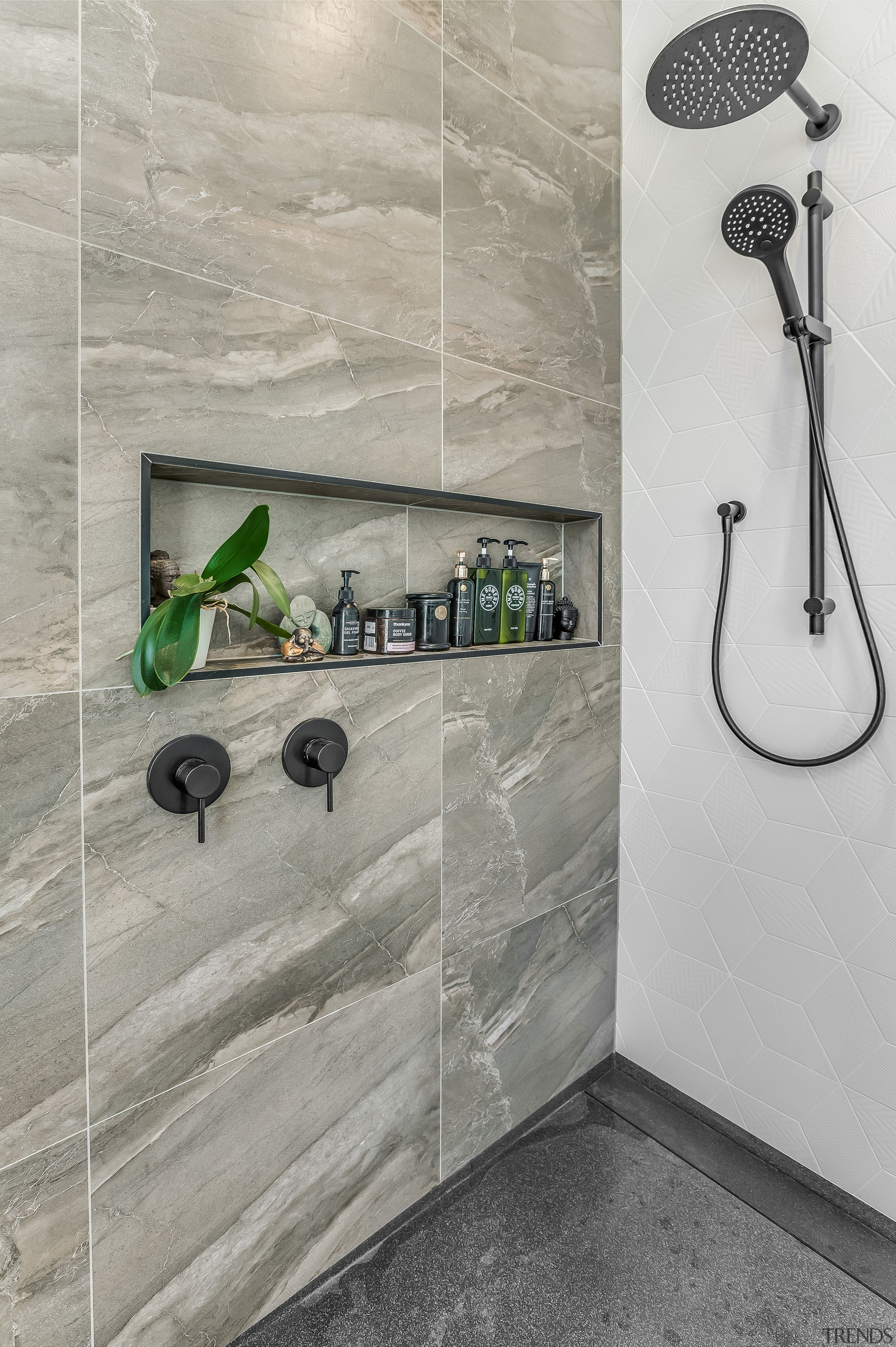 The black granite shower tray works well with 