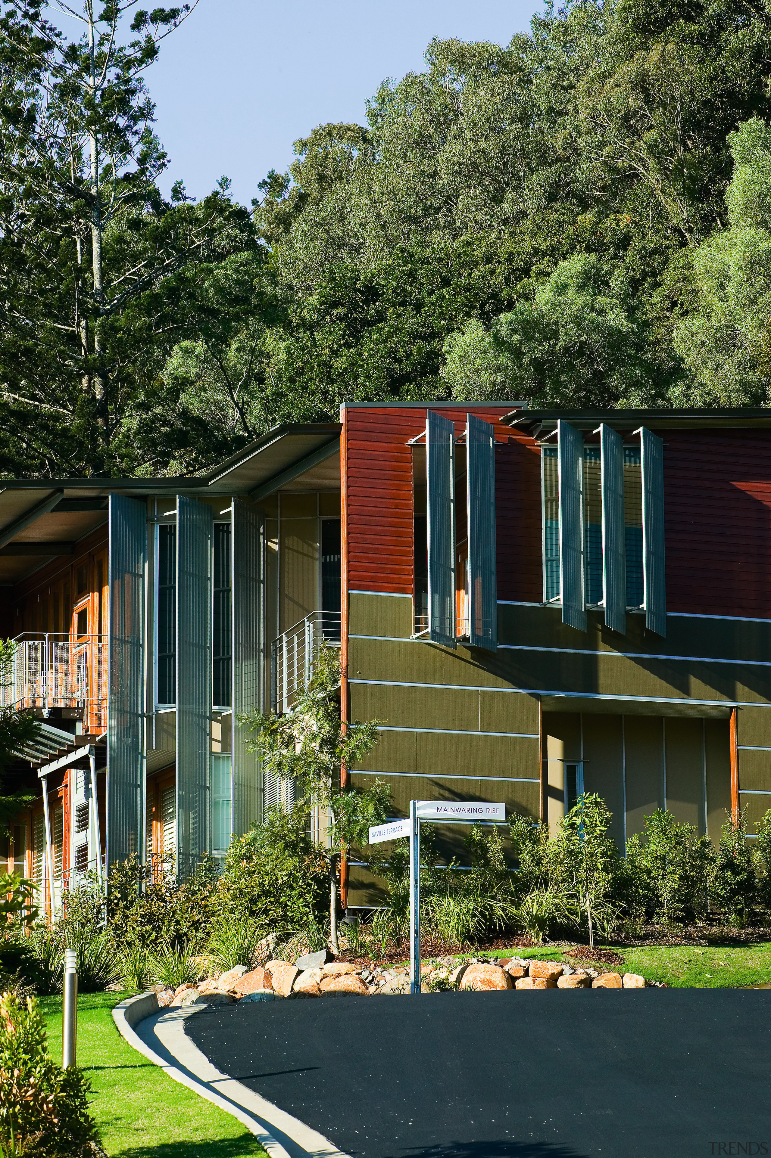 Exterior view of this new apartment block  architecture, building, cottage, facade, home, house, neighbourhood, plant, real estate, residential area, siding, suburb, tree, black, brown
