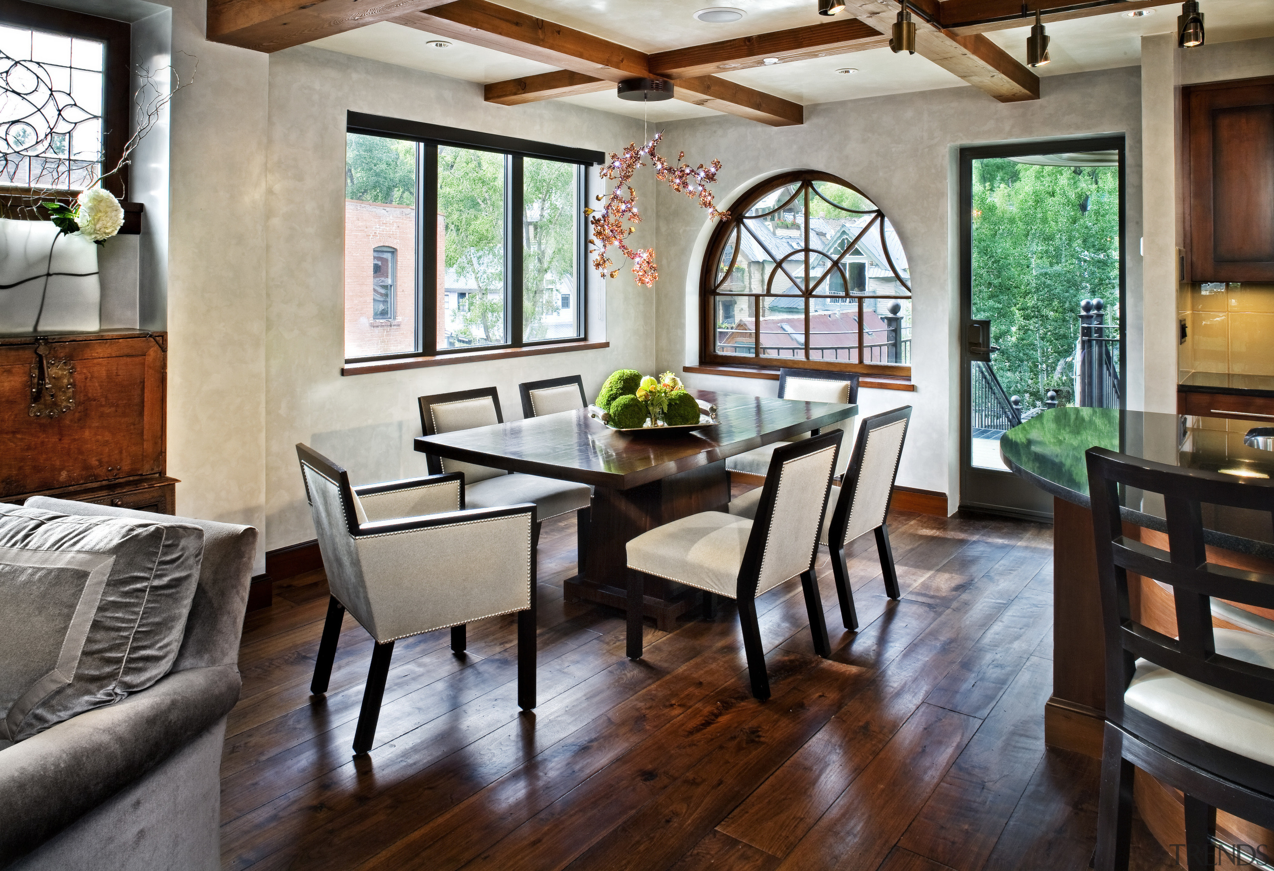view of formal dining area which features dining dining room, home, interior design, living room, real estate, room, table, window, wood, gray