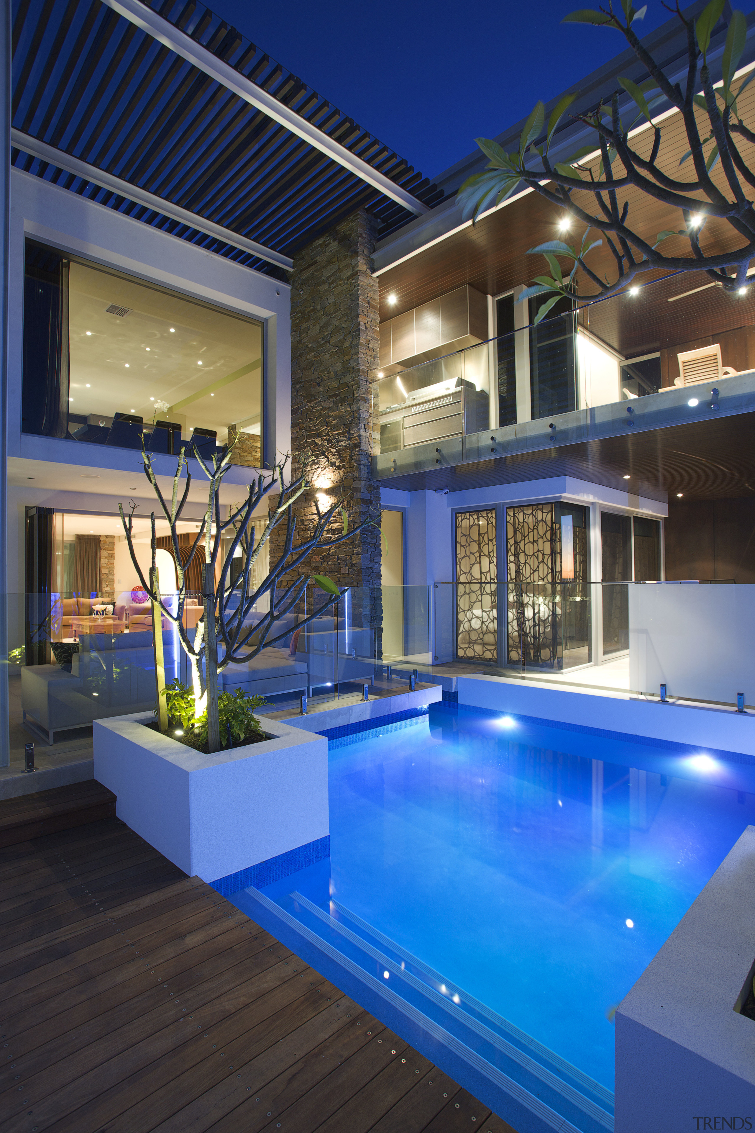 This home was designed by Jason Saunders of architecture, estate, home, house, interior design, leisure, lighting, property, real estate, resort, swimming pool, villa, blue