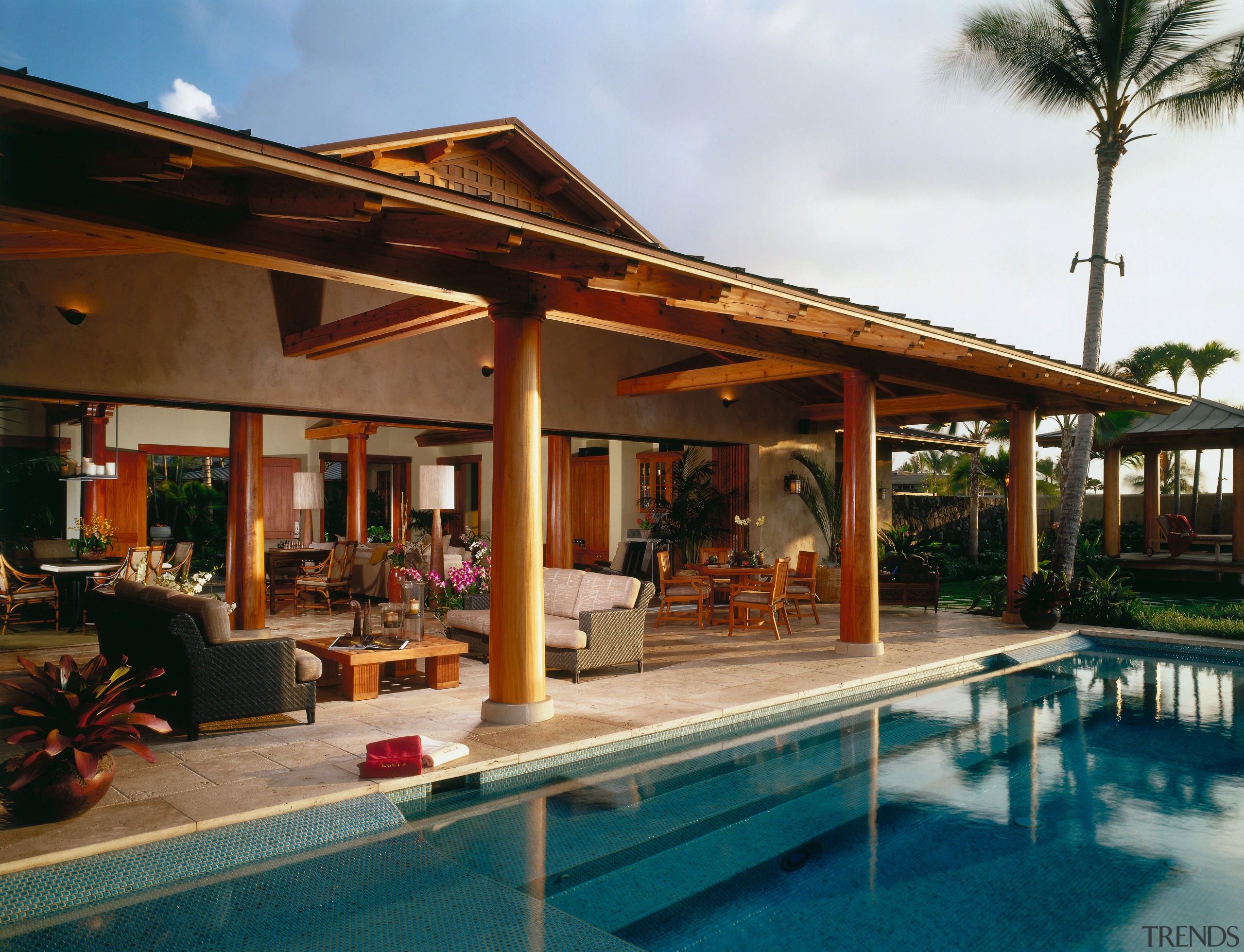 view of the outdoor entertaining area featuring  estate, hacienda, home, house, leisure, outdoor structure, patio, property, real estate, resort, swimming pool, villa, brown