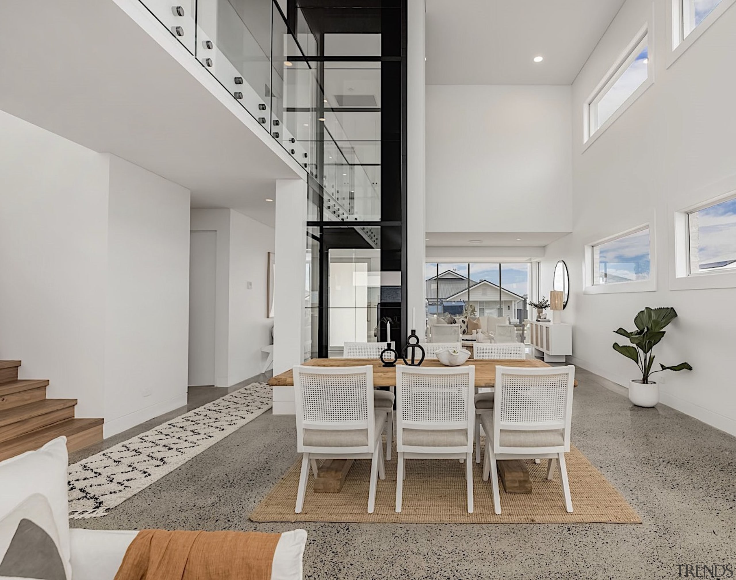 Dining area with feature lift behind. - All 
