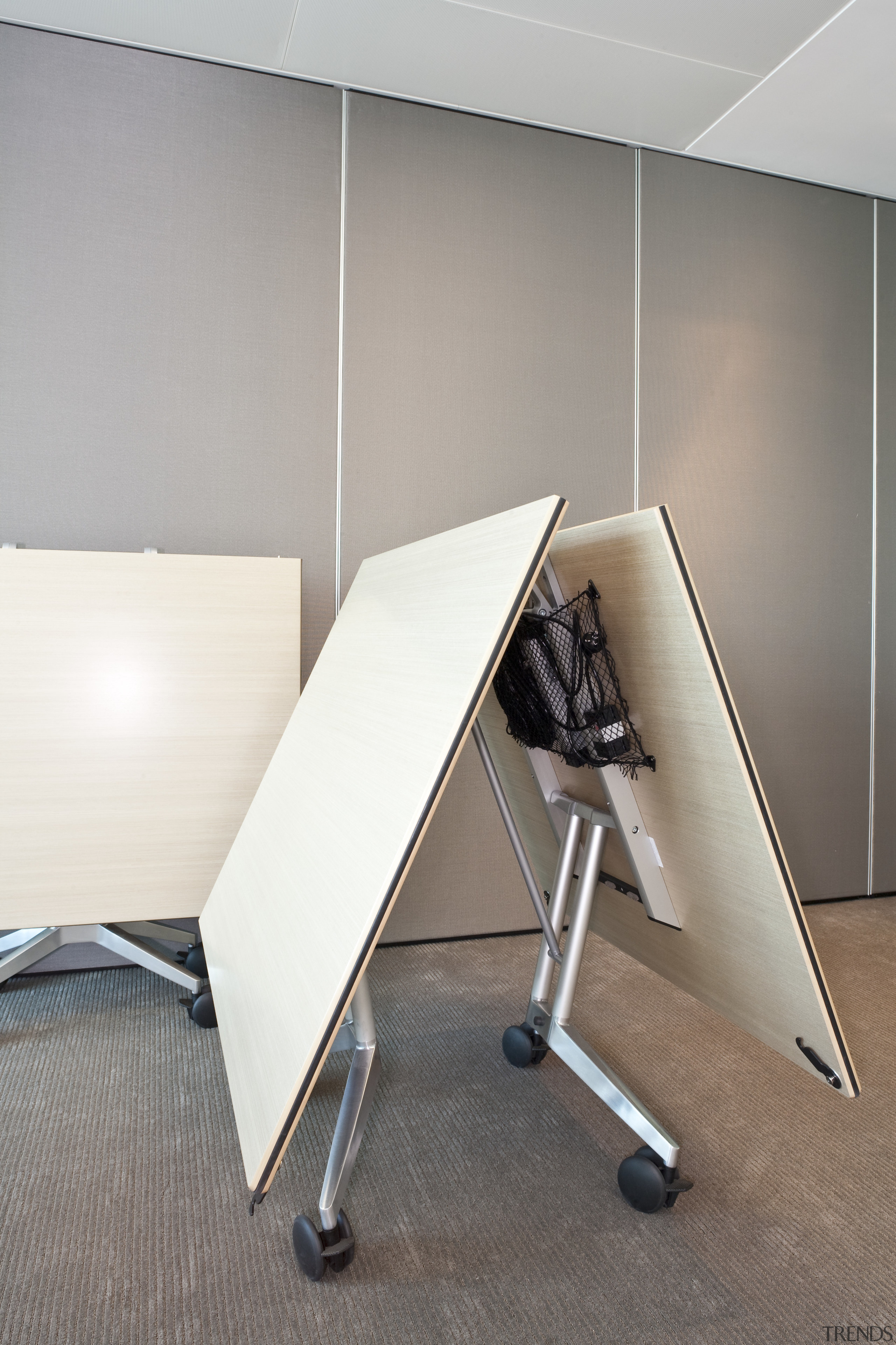 View of contemporary boardroom table from Wilkhan Pacific. angle, chair, floor, furniture, light fixture, lighting, product, product design, table, gray