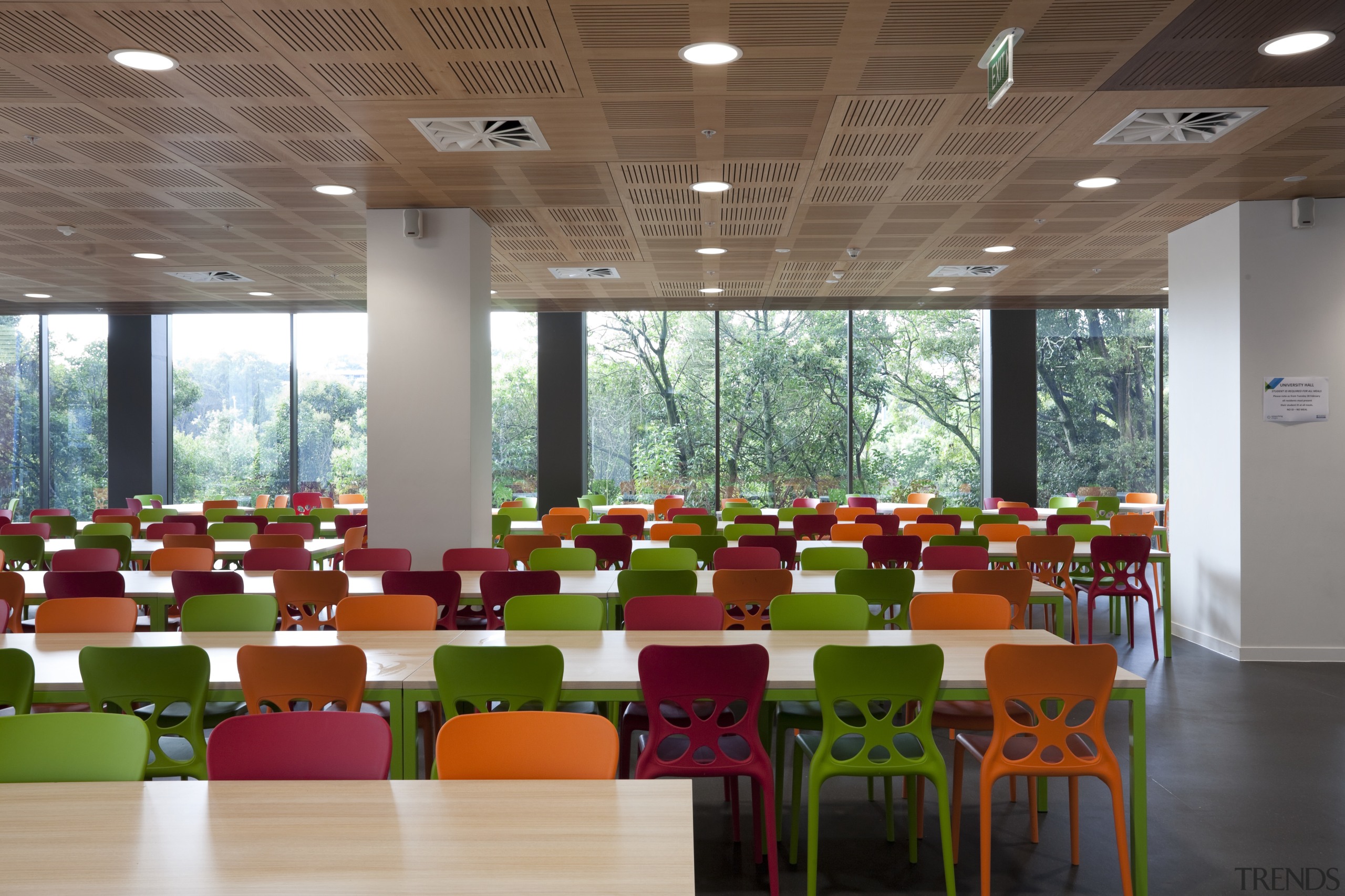 View of study area with colourful chairs. - architecture, cafeteria, classroom, conference hall, function hall, institution, interior design, restaurant, table, brown
