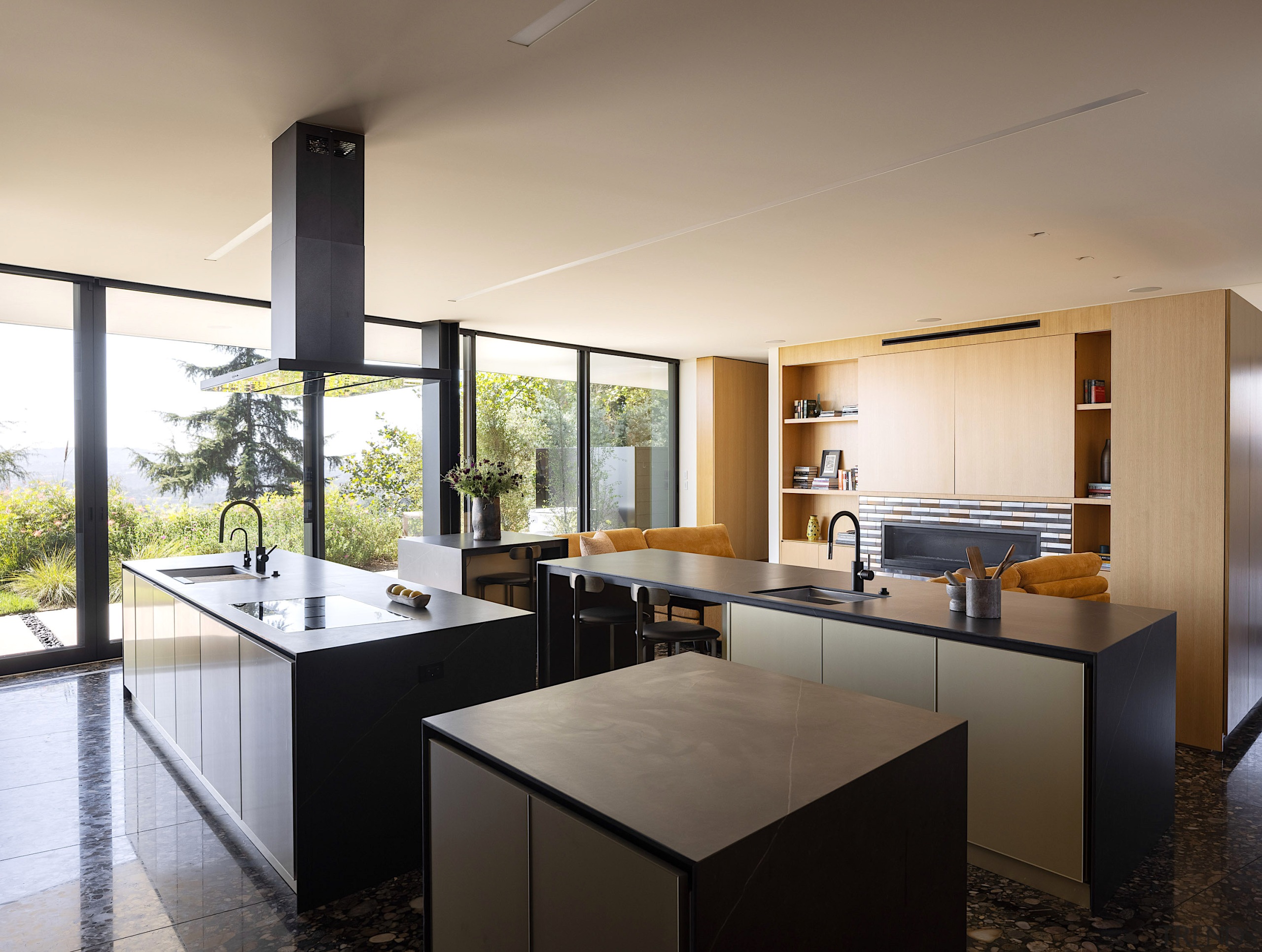 The open living level integrates living, dining, kitchen, 