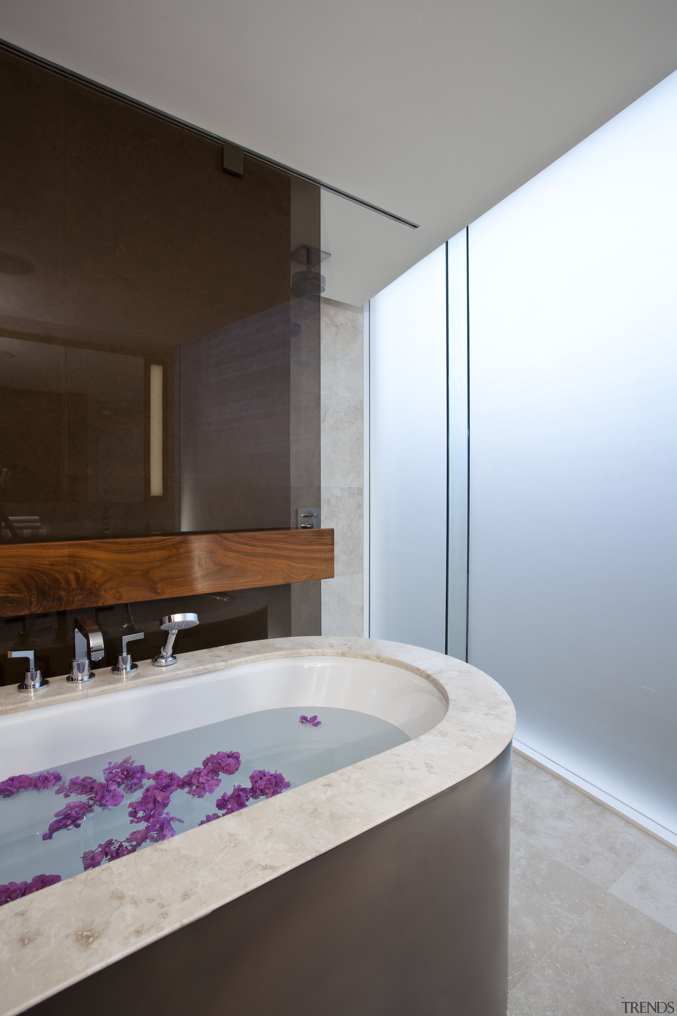 View of bathroom with freestanding tub in a architecture, bathroom, bathtub, daylighting, estate, floor, home, house, interior design, property, room, suite, gray, brown