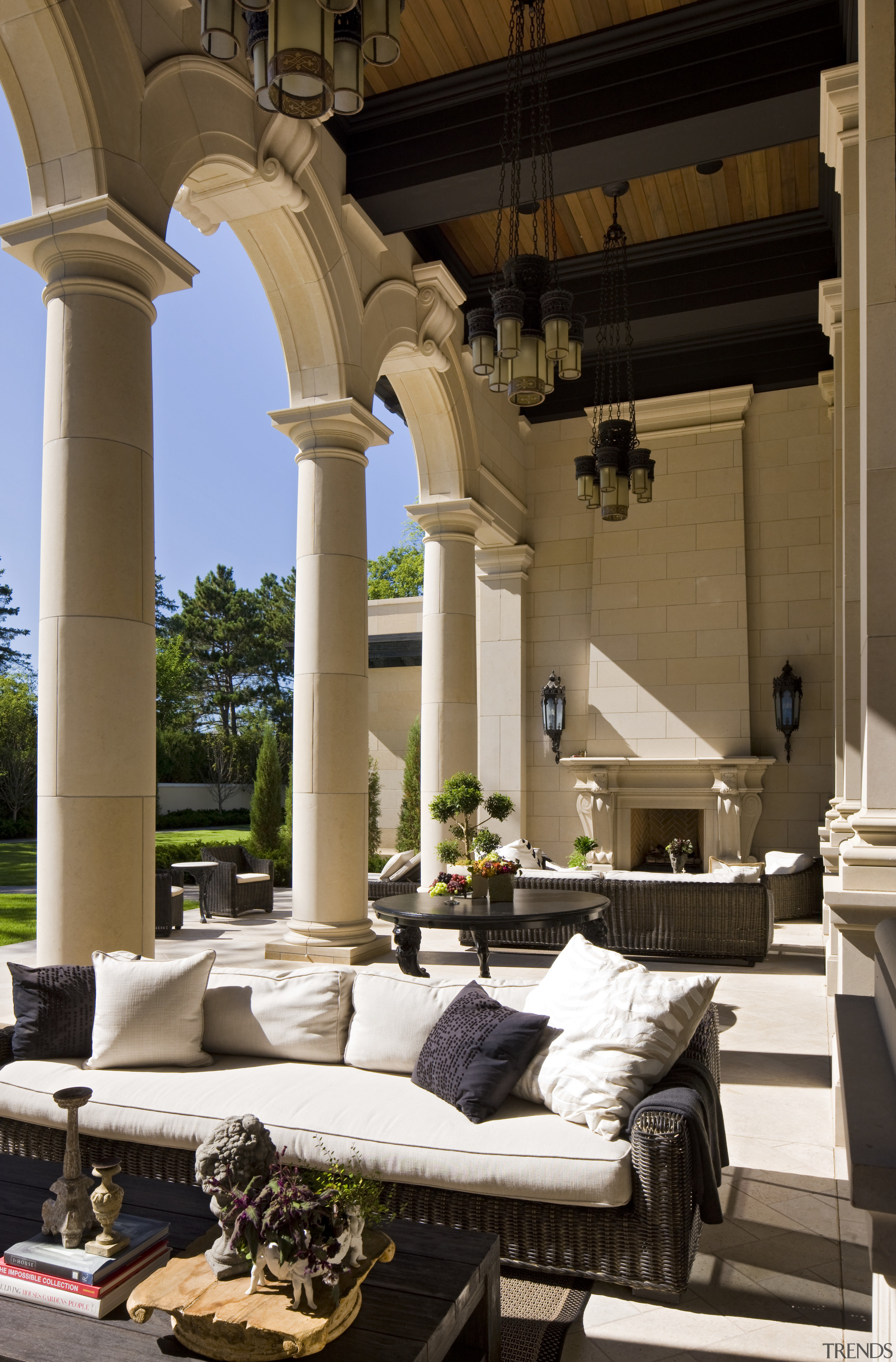 This loggia, at the rear of a large architecture, column, estate, furniture, home, interior design, living room, structure, window, brown