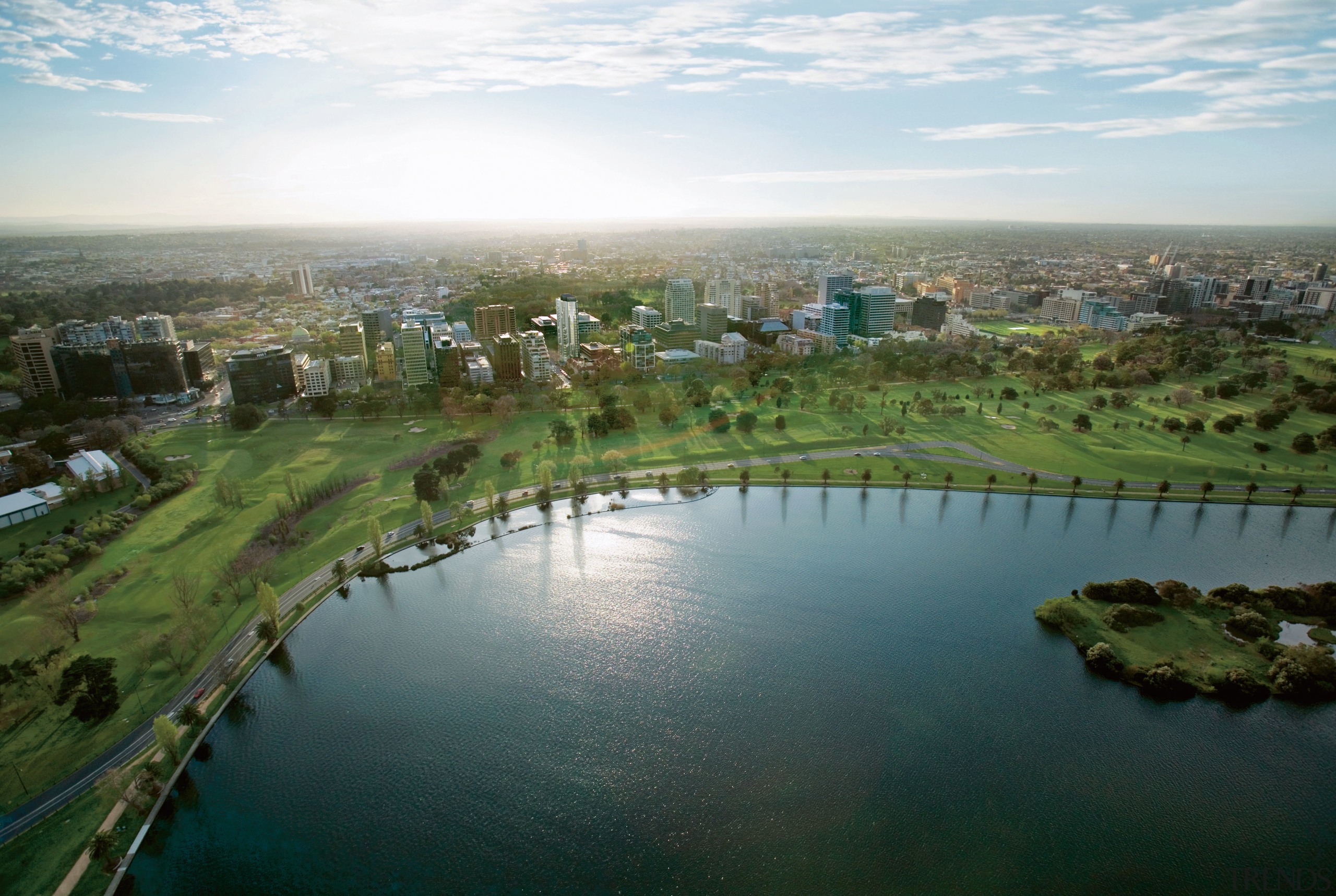 Views from Balencea overlook several nearby parklands, including aerial photography, bird's eye view, city, daytime, floodplain, grass, horizon, reflection, reservoir, residential area, river, sky, suburb, water, water resources, wetland, white