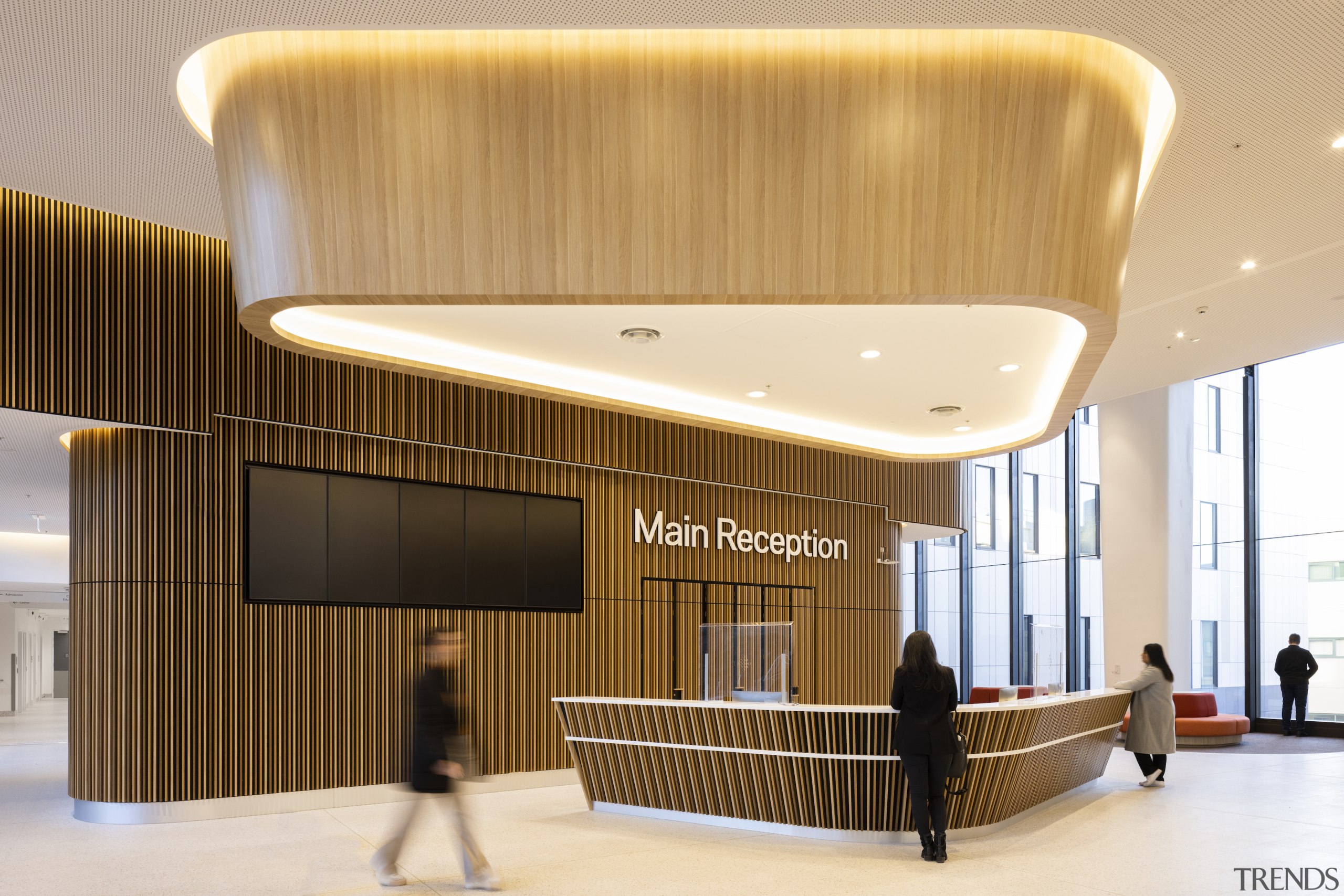 Sweeping curves and timber cladding define the main 